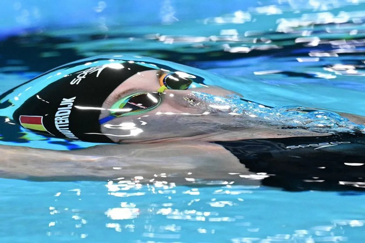 Belgium's Roos Vanotterdijk competes in  a semifinal of the women's 100m backstroke swimming event during the Paris 2024 Olympic Games at the Paris La Defense Arena in Nanterre, west of Paris, on July 29, 2024.  Oli SCARFF / AFP