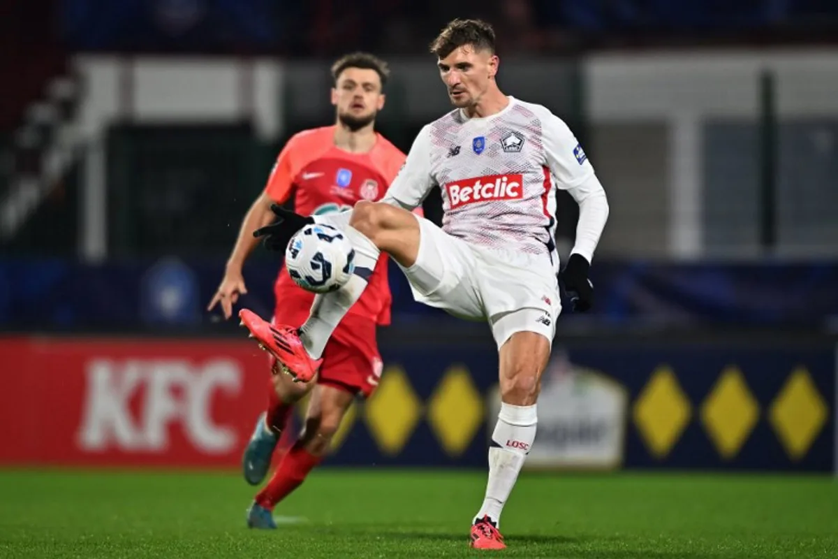 Lille's Belgian defender #03 Thomas Meunier controls the ball during the French Cup football match between FC Rouen and LOSC Lille, at the Robert Diochon Stadium in Petit-Quevilly, north-western France, on December 20, 2024.  Lou BENOIST / AFP