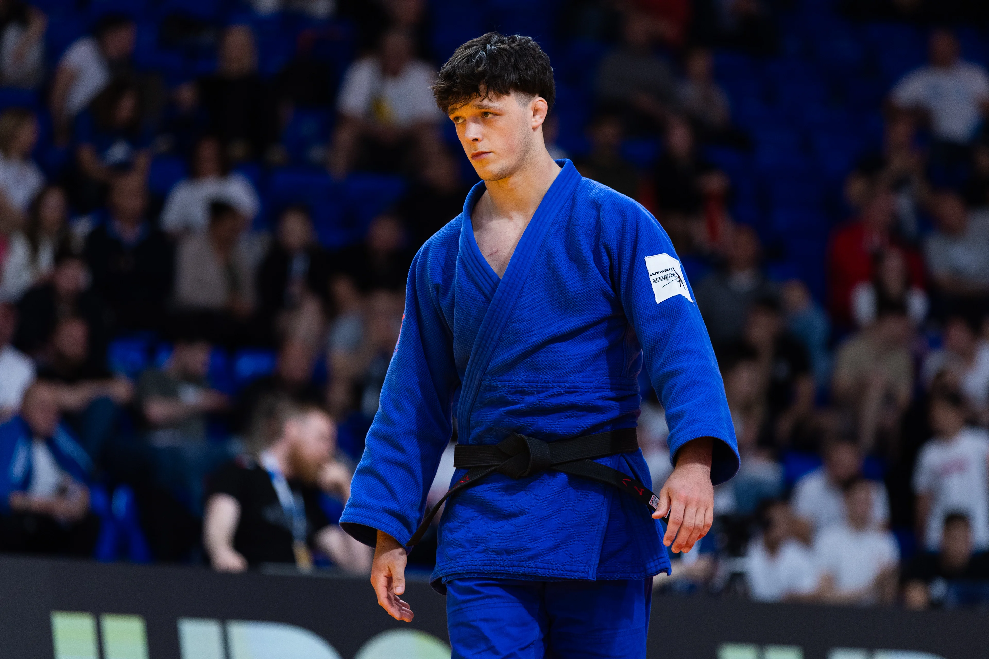 Belgian Noah Christiaens (blue gi) takes on Bosnian Vucurevic (not pictured) in a judo bout in the men's -90kg category, at the European Judo Championships in Podgorica, Montenegro, on Friday 25 April 2025. The tournament is taking place from 23 tot 27 April 2025. BELGA PHOTO NIKOLA KRISTC