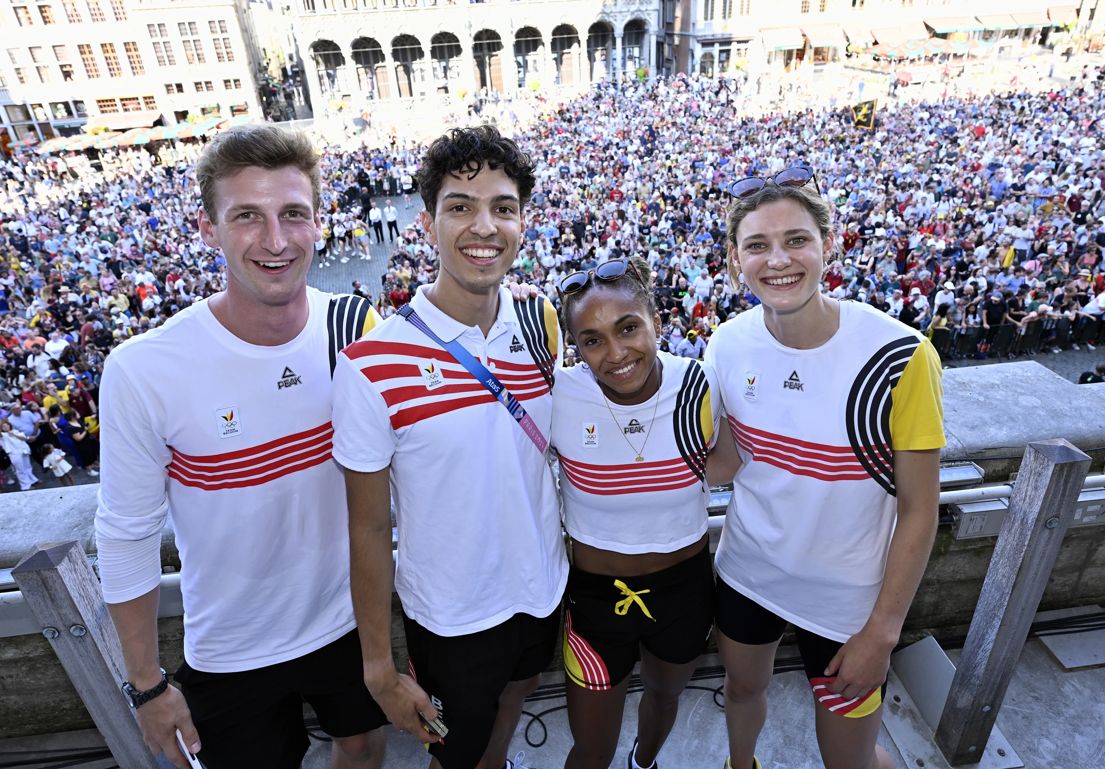 Belgian athletes Alexander Doom, Jonathan Sacoor, Naomi Van den Broeck and Helena Ponette pose at celebrations after the Paris 2024 Olympic Games, at the Grand Place - Grote Markt and the Brussels City Hall, in Brussels, on Monday 12 August 2024. The Belgian delegation at the Games of the XXXIII Olympiad counted 165 athletes competing in 21 sports. BELGA PHOTO ERIC LALMAND