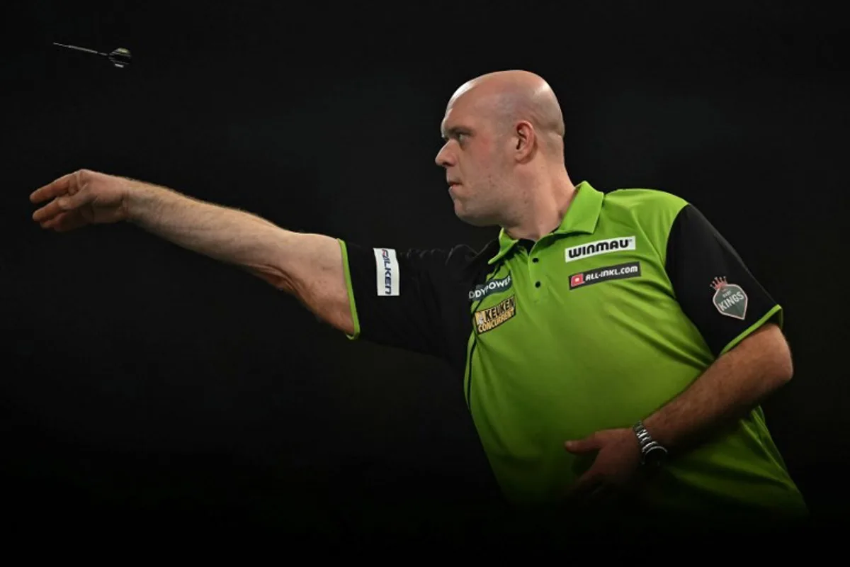 Netherlands' Michael van Gerwen plays against England's Chris Dobey in their PDC World Darts Championship semi- final, at Alexandra Palace in London on January 2, 2025.  Ben STANSALL / AFP