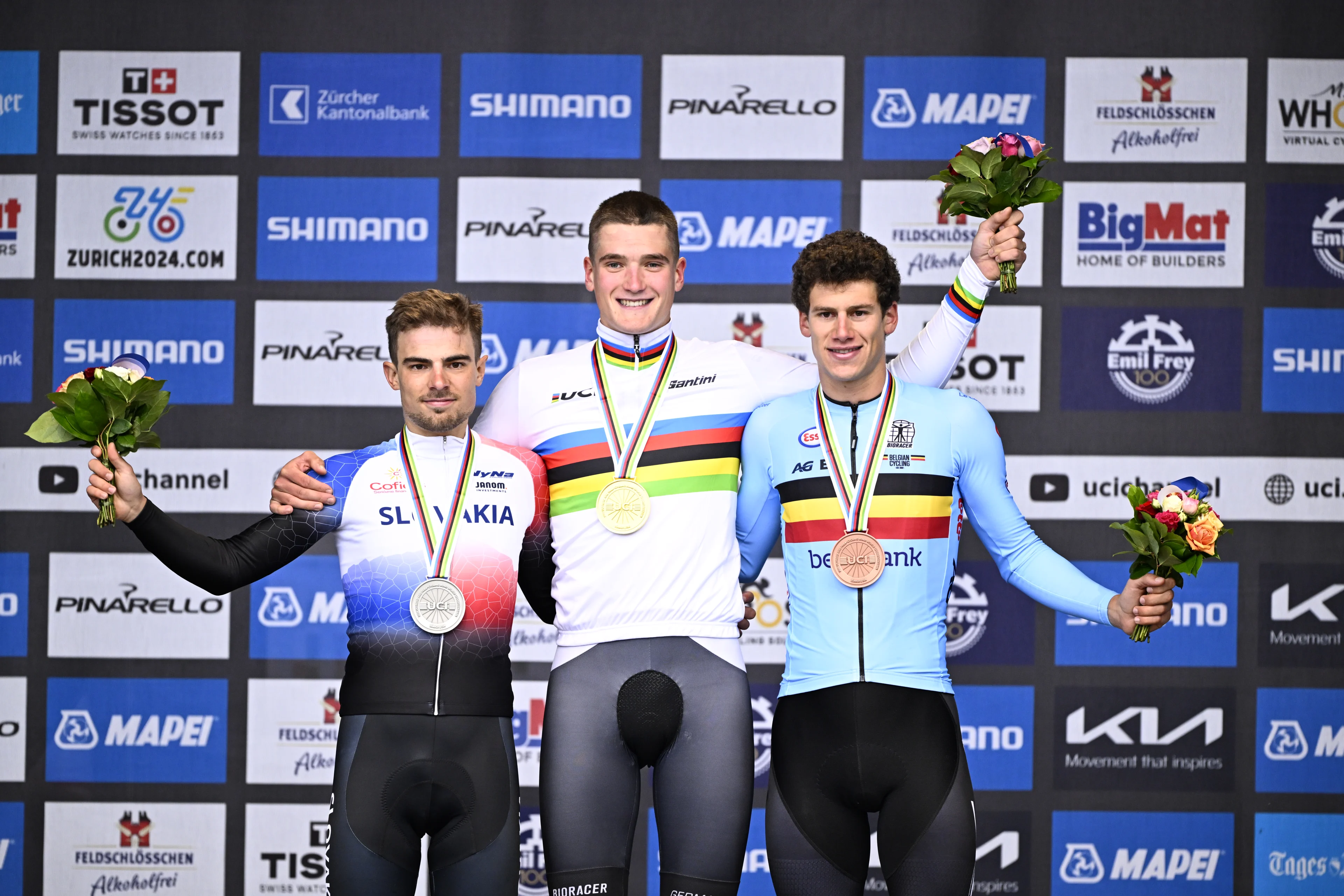 Slovak silver medallist Martin Svrcek, German gold medallist Niklas Behrens and Belgian bronze medallist Alec Segaert celebrate on the podium of the U23 Men road race at the 2024 UCI Road and Para-Cycling Road World Championships, Friday 27 September 2024, in Zurich, Switzerland. The Worlds are taking place from 21 to 29 September. BELGA PHOTO JASPER JACOBS