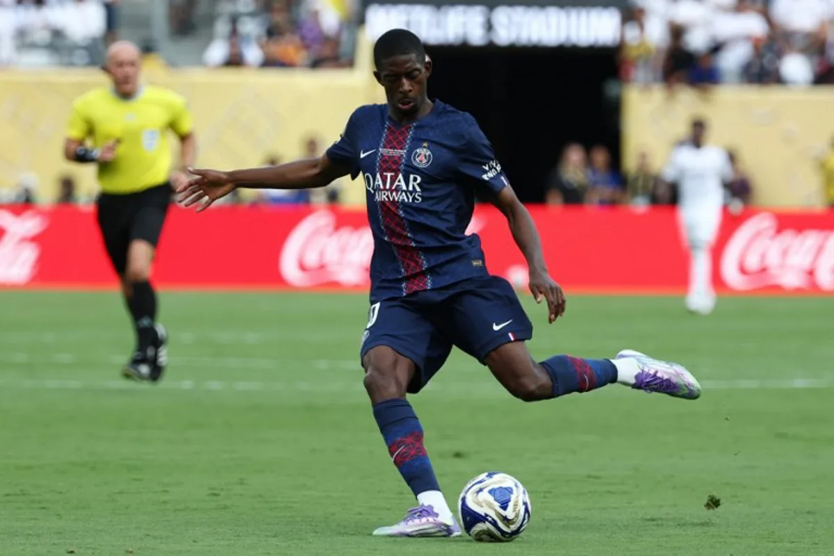 Paris Saint-Germain's French forward #10 Ousmane Dembele kicks the ball during the FIFA Club World Cup 2025 semifinal football match between France's Paris Saint-Germain and Spain's Real Madrid at the MetLife stadium in East Rutherford, New Jersey on July 9, 2025. FRANCK FIFE / AFP