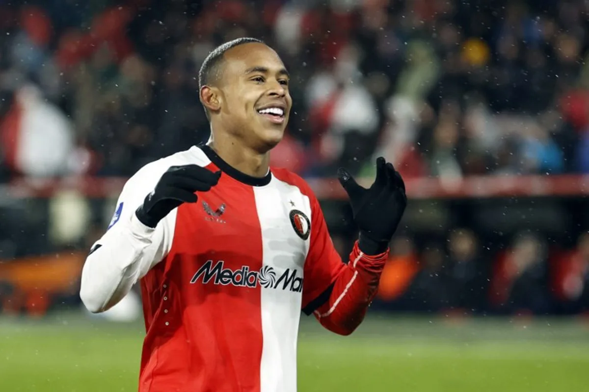 Feyenoord's Brazilian forward #14 Igor Paixao celebrates scoring his team's thrid goal during the Dutch Eredivisie football match between Feyenoord and SC Heerenveen at the Feyenoord "De Kuip" stadium in Rotterdam, on November 23, 2024. MAURICE VAN STEEN / ANP / AFP
