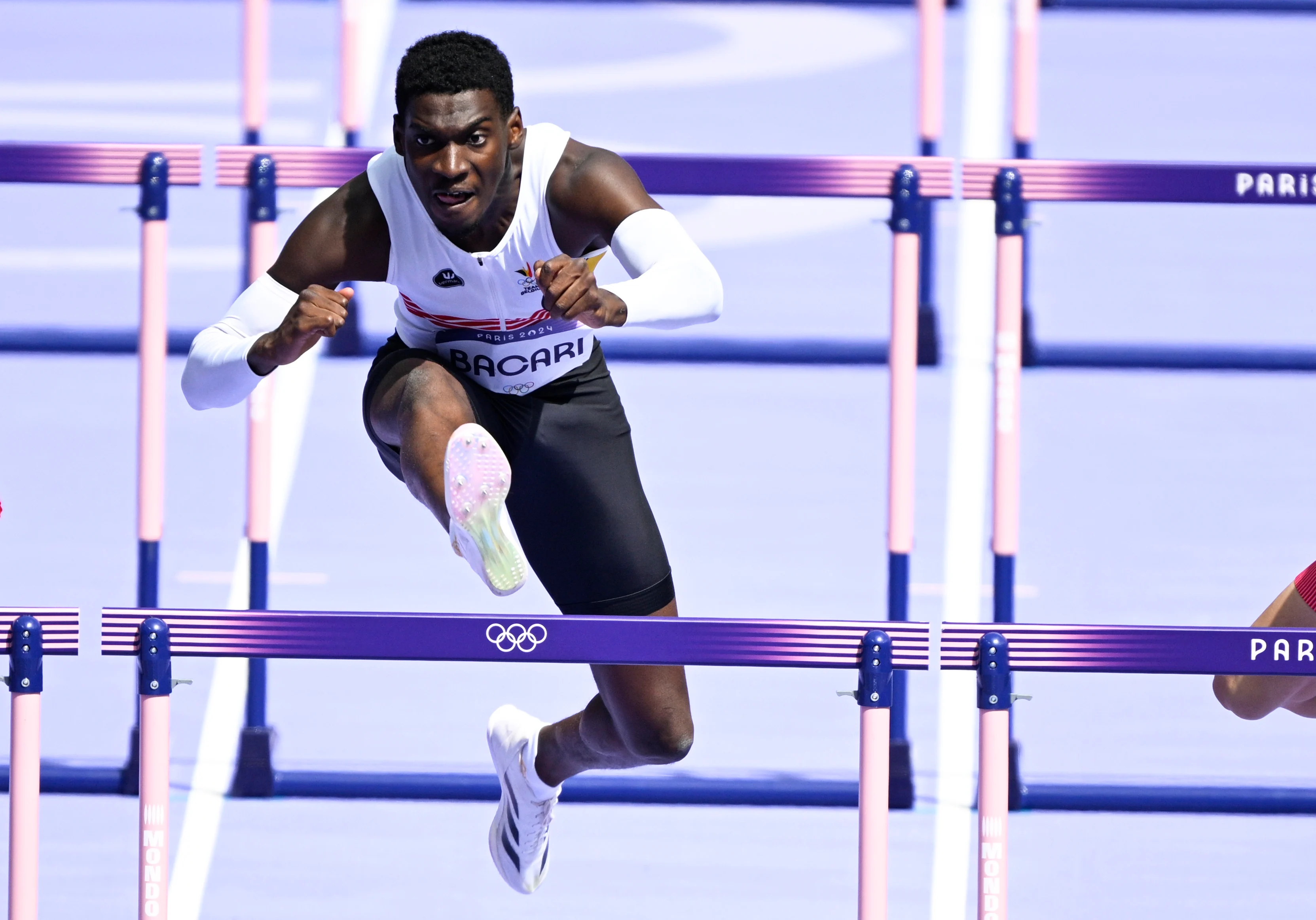 Belgian athlete Elie Bacari pictured in action during the Men's 110m hurdles round 1 of the athletics competition at the Paris 2024 Olympic Games, on Sunday 04 August 2024 in Paris, France. The Games of the XXXIII Olympiad are taking place in Paris from 26 July to 11 August. The Belgian delegation counts 165 athletes competing in 21 sports. BELGA PHOTO JASPER JACOBS