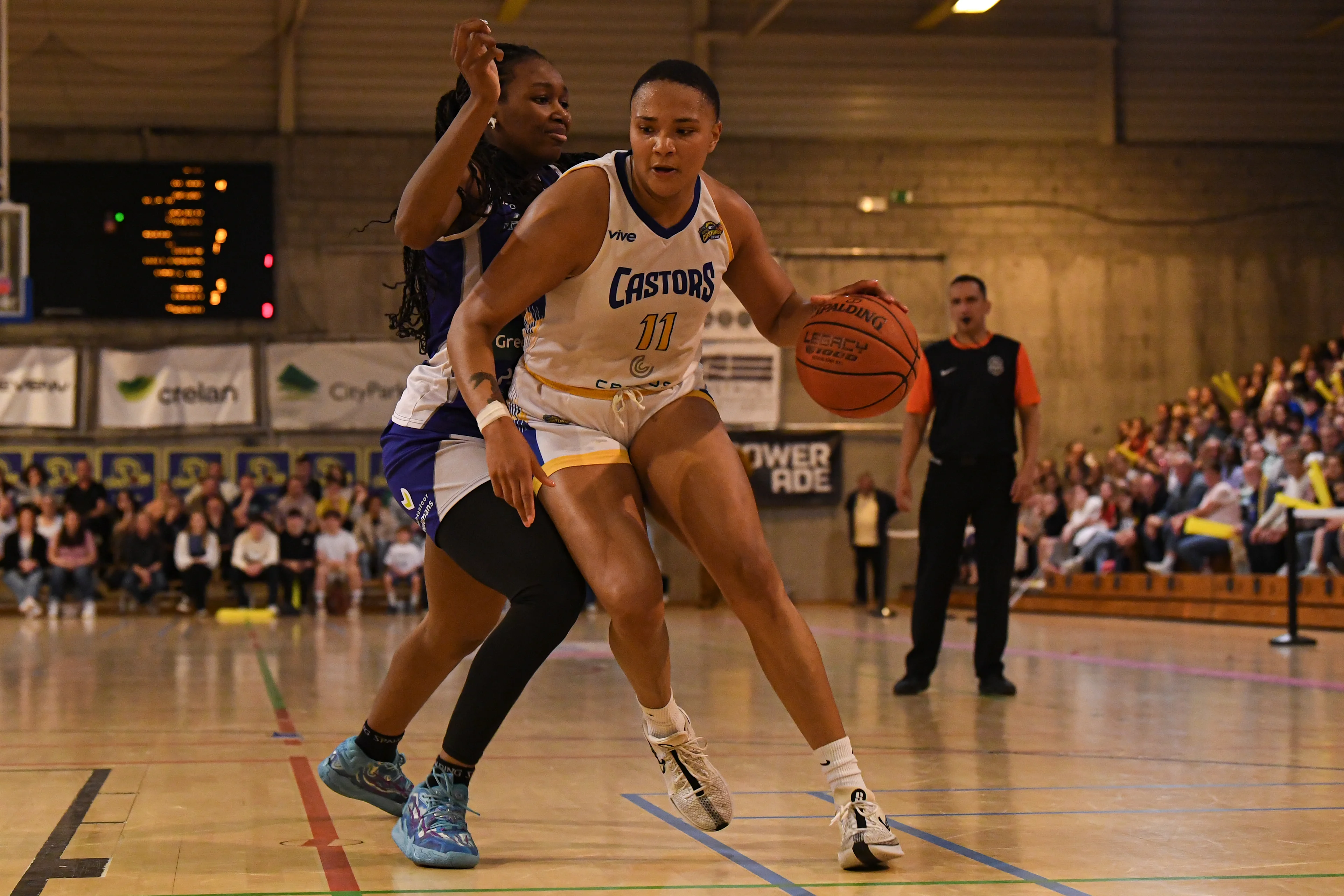 Mechelen's Annie Kibedi and Castors' Jaquaya Miller pictured in action during a basketball match between Royal Castors Braine and Kangoeroes Mechelen, Tuesday 22 April 2025, in Braine-l'Alleud, a 3rd leg best-of-3 game in the play-offs finals of the Women's Top Division Belgian basketball competition. BELGA PHOTO JILL DELSAUX