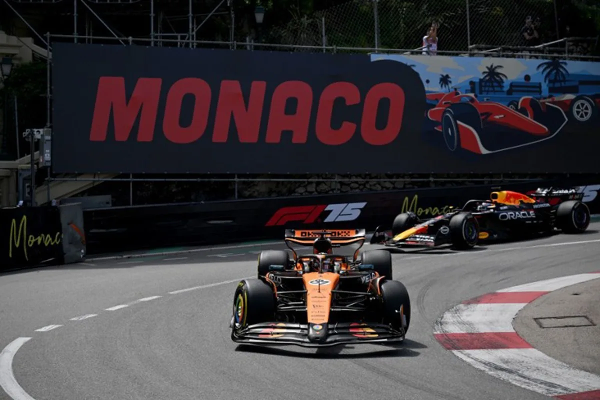 McLaren's Australian driver Oscar Piastri (C) races ahead of Red Bull Racing's Dutch driver Max Verstappen (R) during the Formula One Monaco Grand Prix at the Circuit de Monaco, on May 25, 2025. Christophe Simon / AFP