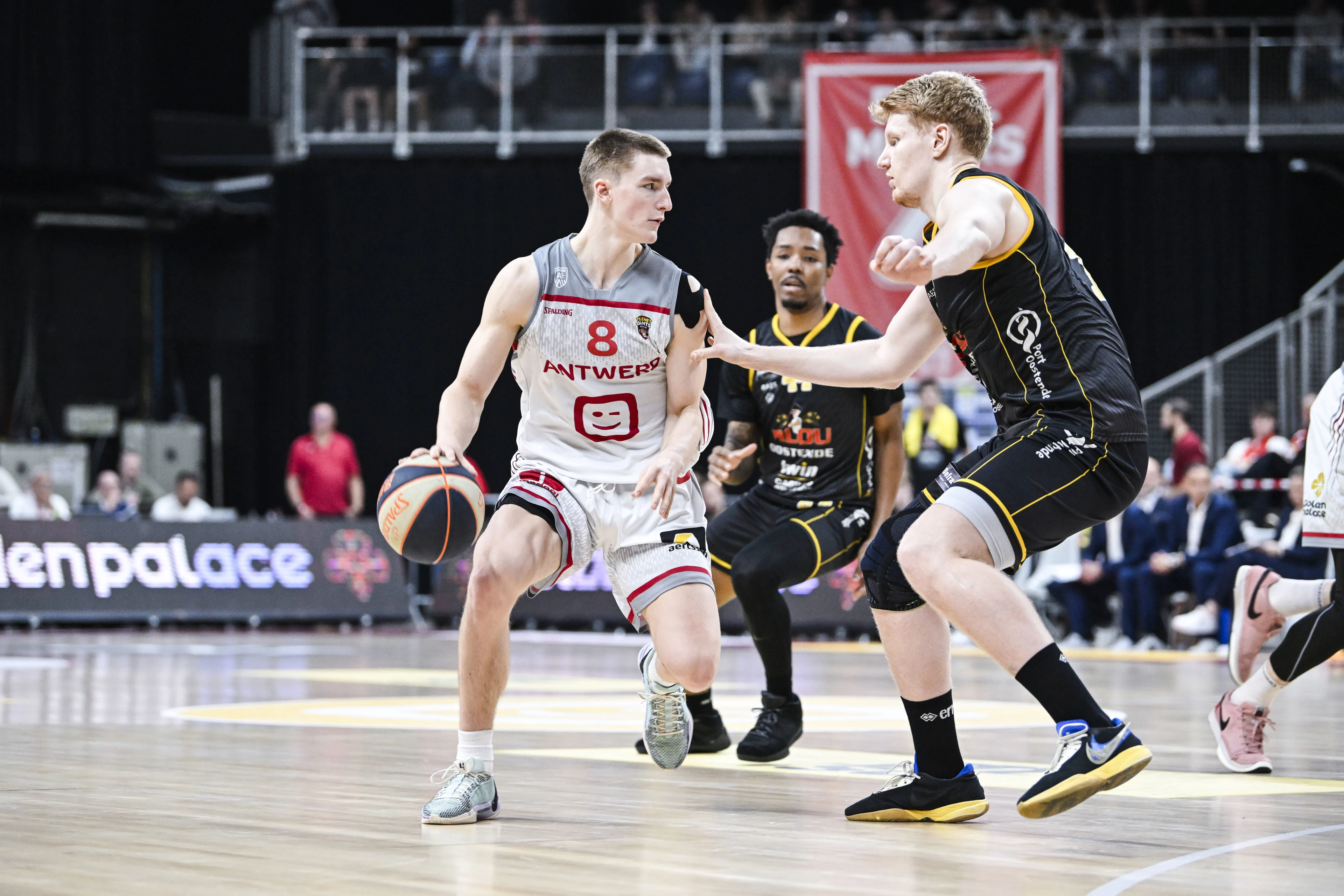 Antwerp's Jo Van Buggenhout and Oostende's Matthias Tass pictured in action during a basketball match between Antwerp Giants and BC Oostende, Monday 03 June 2024 in Antwerp, match 4 (best of 5) of the Belgian finals of the 'BNXT League' first division basket championship. BELGA PHOTO TOM GOYVAERTS