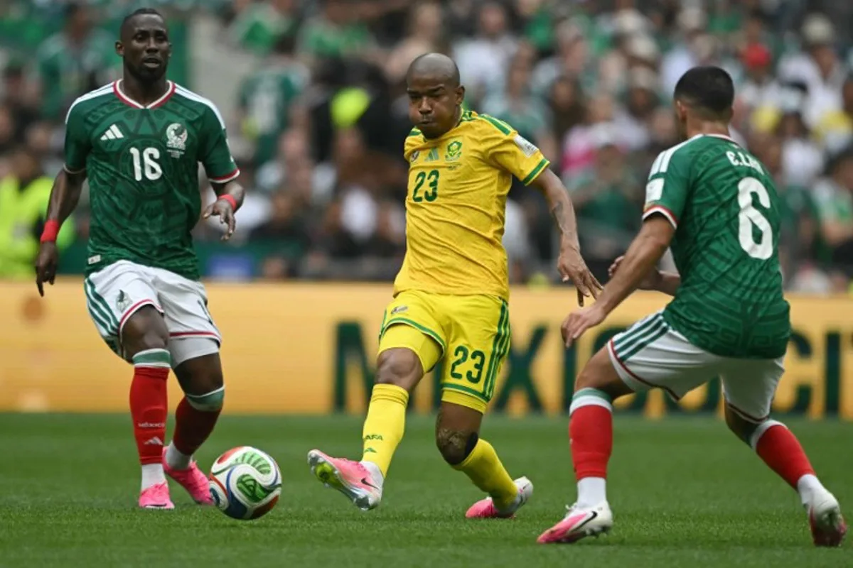Mexico's forward #16 Julian Quinones, South Africa's midfielder #23 Jayden Adams and Mexico's midfielder #06 Erik Lira during the 2026 World Cup Group A football match between Mexico and South Africa at the Mexico City Stadium in Mexico City on June 11, 2026. CARL DE SOUZA / AFP