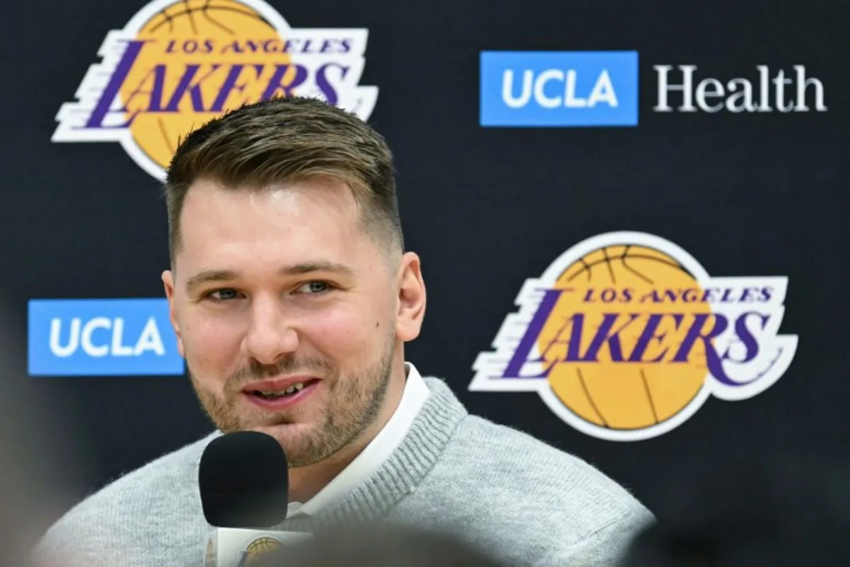 Slovenian basketball player Luka Doncic speaks during a press conference introducing him as the newest member of the Los Angeles Lakers, at the UCLA Health Training Center, in El Segundo, California on February 4, 2025. Slovenian star Luka Doncic said February 2, 2025 he thought he'd spend his entire NBA career in Dallas, thanking fans in Texas for making it feel like home a day after the Mavericks abruptly traded him to the Los Angeles Lakers. Patrick T. Fallon / AFP