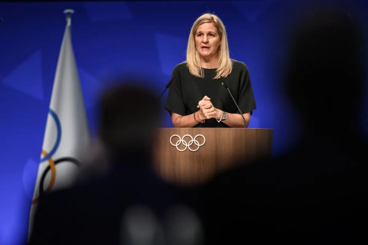International Olympic Committee president (IOC) Kirsty Coventry delivers her speech at the opening of an IOC session, in Lausanne, on June 24, 2026.  Fabrice COFFRINI / AFP