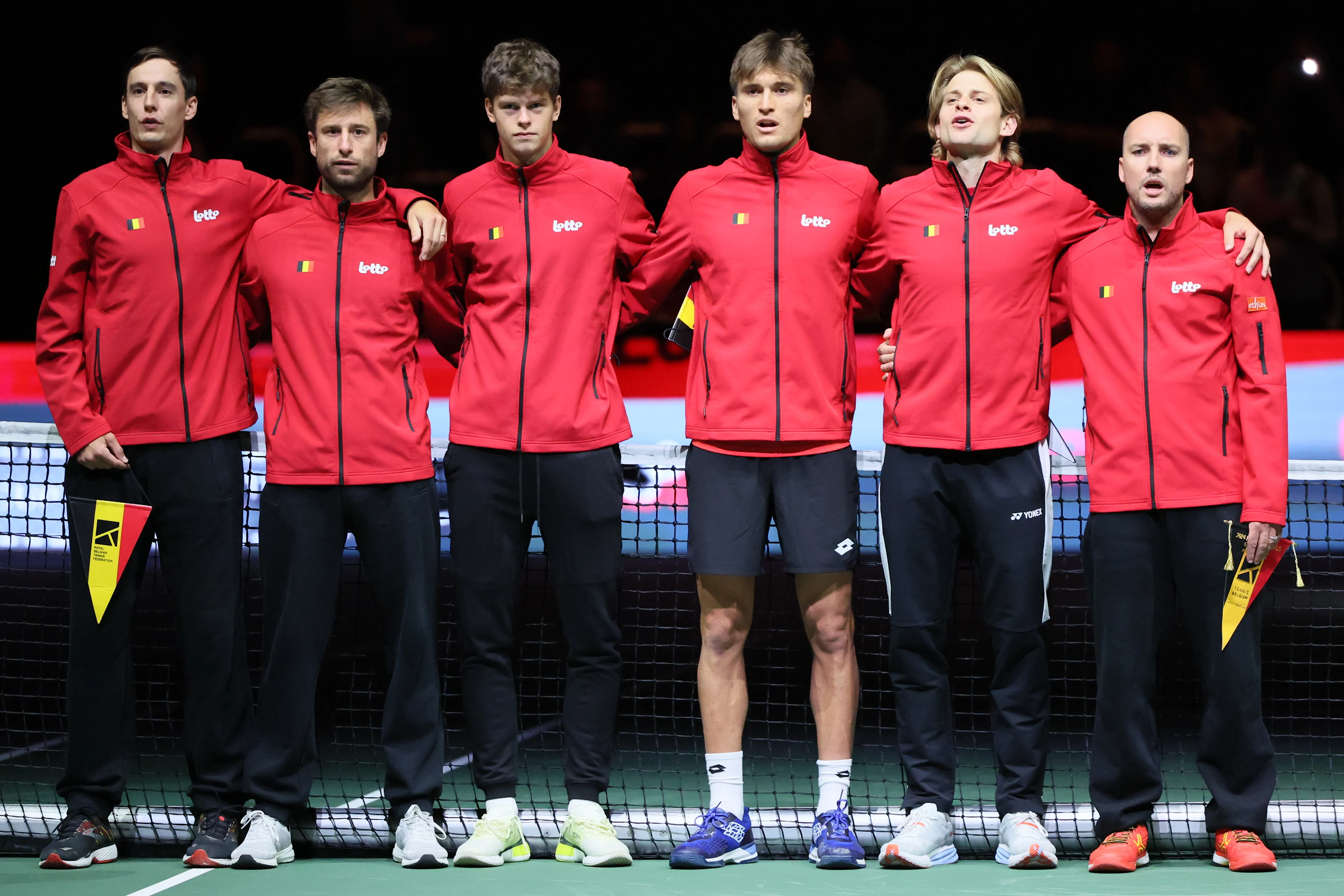 L-R, Belgian Joran Vliegen, Belgian Sander Gille, Belgian Alexander Blockx, Belgian Raphael Collignon, Belgian Zizou Bergs, Belgian captain Steve Darcis and pictured before a game between Belgian Raphael Collignon and Brazilian Joao Fonseca, the first match in the group A Davis Cup Finals group stage between Belgium and Brazil, Saturday 14 September 2024, at the Unipol Arena, in Bologna, Italy. BELGA PHOTO BENOIT DOPPAGNE