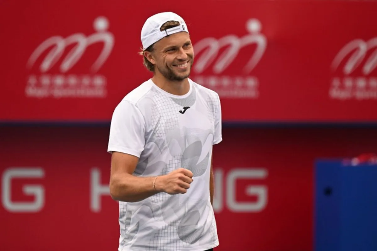 France's Alexandre Muller celebrates defeating Spain's Jaume Munar in their men's singles semi-final match at the Hong Kong Open tennis tournament in Hong Kong on January 4, 2025.  Peter PARKS / AFP