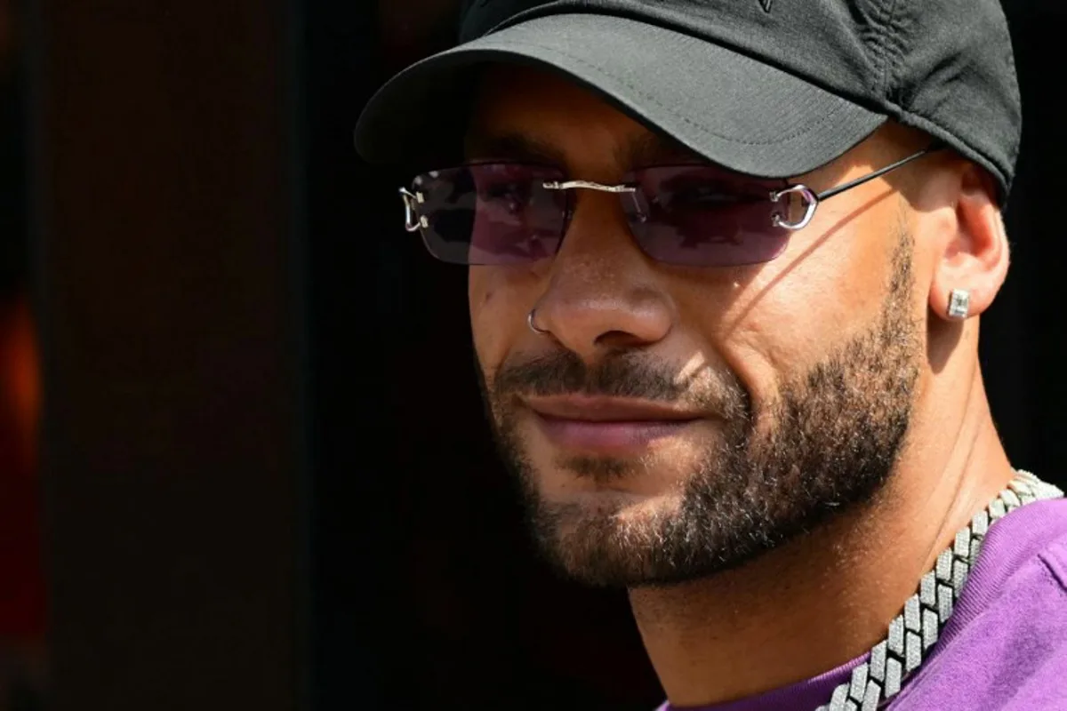 Italian athlete and sprinter Marcell Jacobs looks on ahead of the Italian Formula One Grand Prix race at Autodromo Nazionale Monza circuit, in Monza on September 1, 2024. Andrej ISAKOVIC / AFP