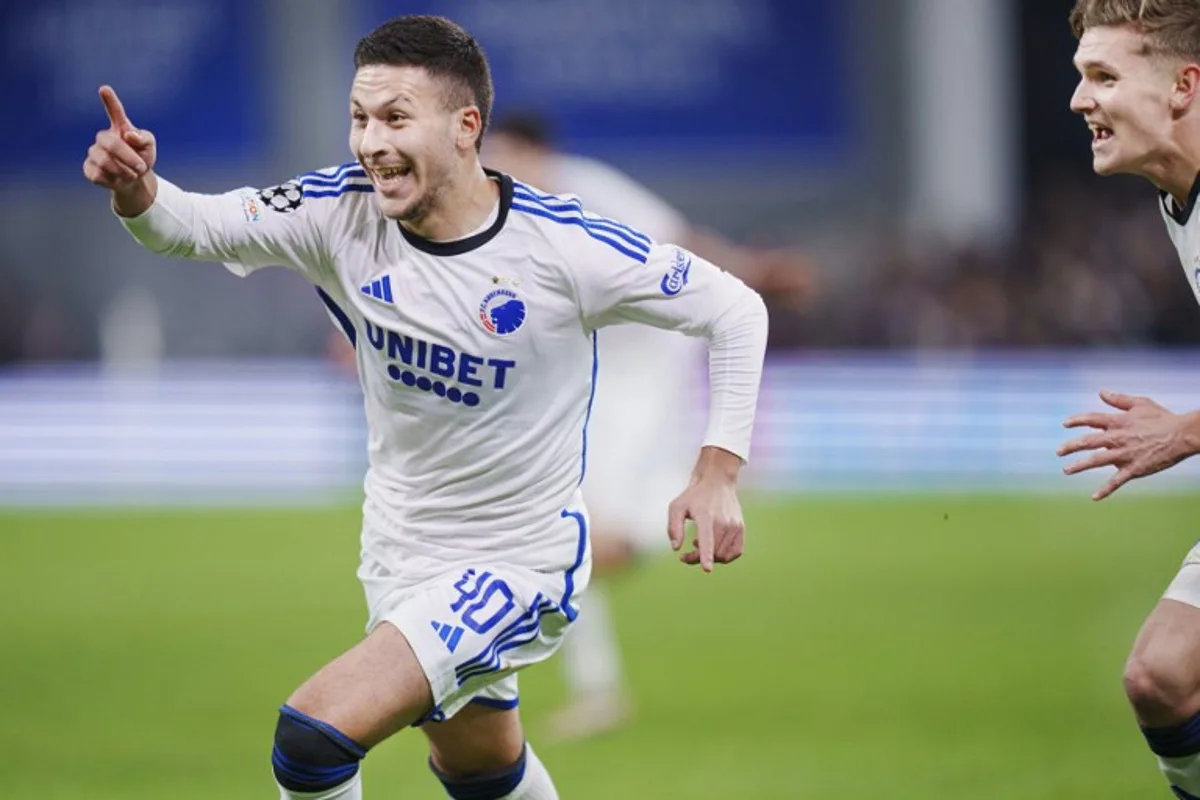 FC Copenhagen's Sweden's forward #40 Roony Bardghji (L) celebrates after scoring the 4-3 during the UEFA Champions League Group A football match between FC Copenhagen and Manchester United FC in Copenhagen, Denmark on November 8, 2023. Liselotte Sabroe / Ritzau Scanpix / AFP