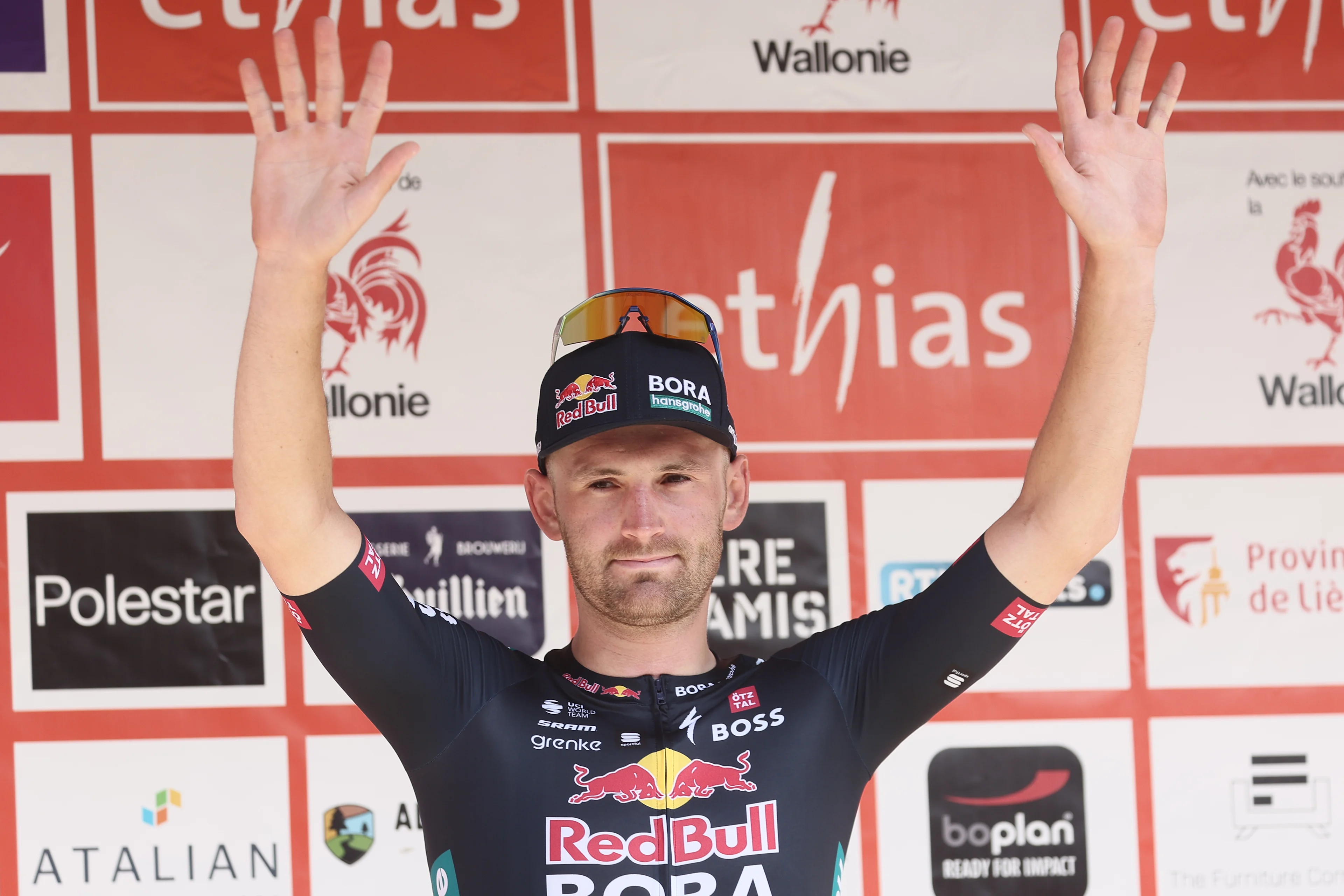 Belgian Jordi Meeus of Red Bull-Bora-Hansgrohe celebrates on the podium after winning stage 1 of the Tour De Wallonie cycling race, from Tournai to Fleurus (178,6 km), Monday 22 July 2024. This year's Tour de Wallonie takes place from 22 to 26 July 2023. BELGA PHOTO BRUNO FAHY