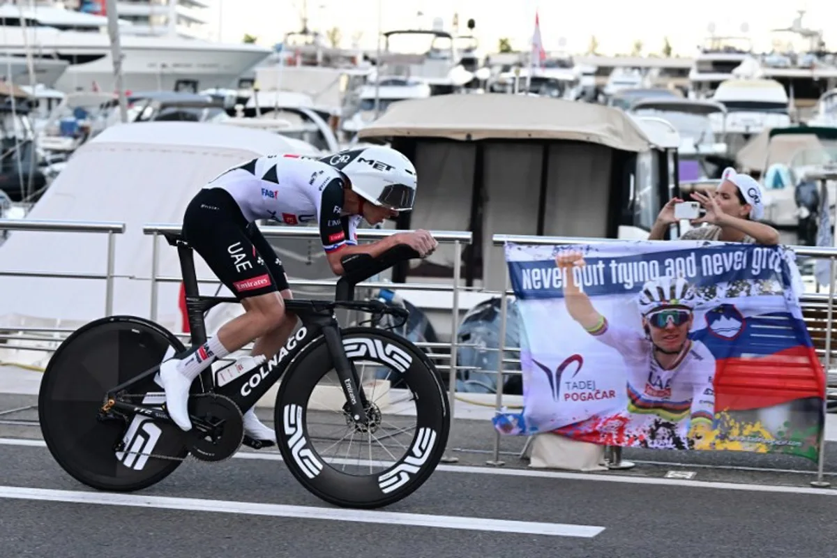 UAE Team Emirates - XRG team's Slovenian rider Tadej Pogacar competes during the first stage of the Vuelta a Espana 2026, a 9,4 km time-trial between Monaco and Monaco on August 22, 2026.  Miguel MEDINA / AFP
