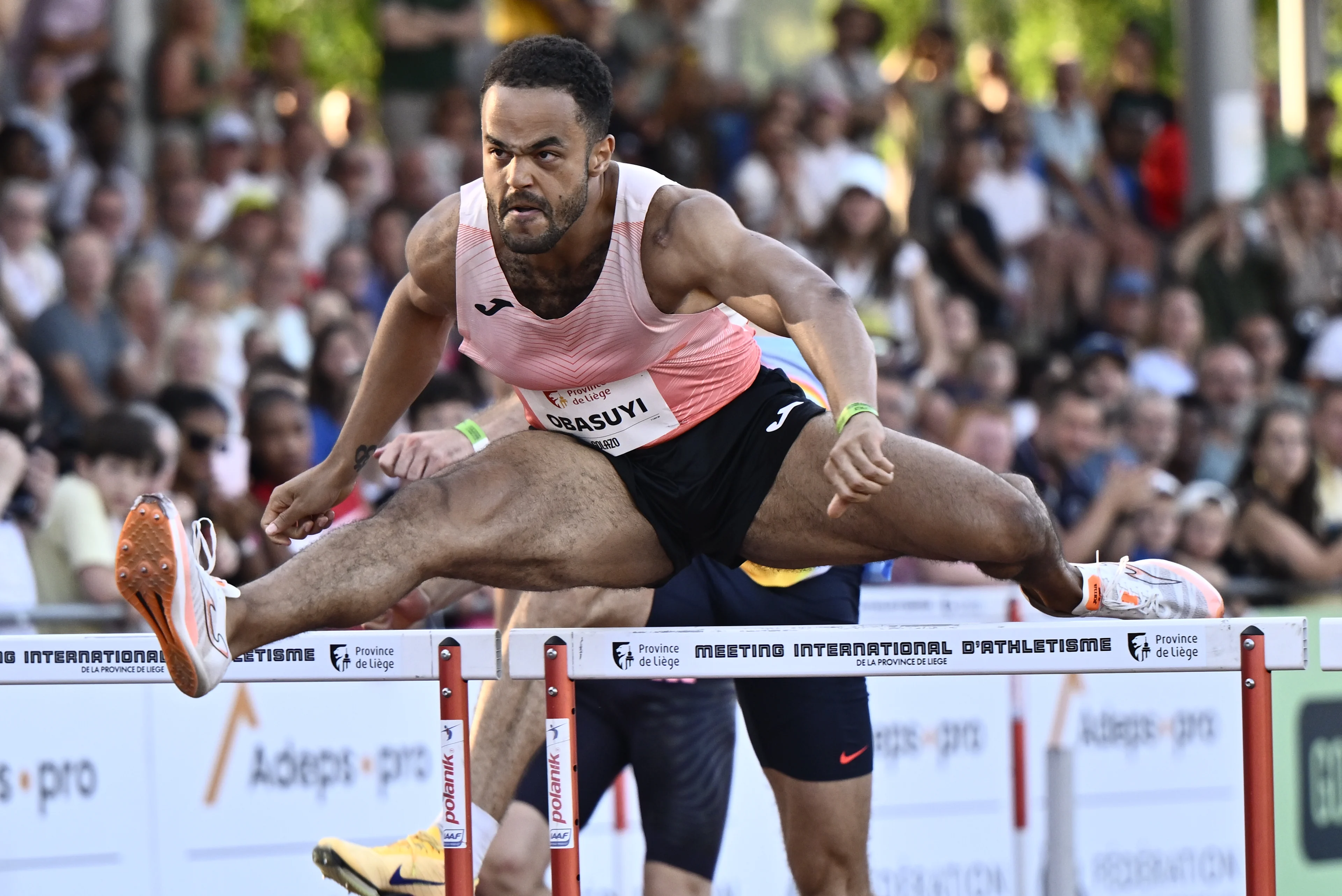 Belgian Michael Obasuyi pictured in action during the 100M hurdles at the 2026 edition of the 'Meeting International d'Athletisme de la Province de Liege' athletics event in Liege, Wednesday 15 July 2026.  BELGA PHOTO ERIC LALMAND