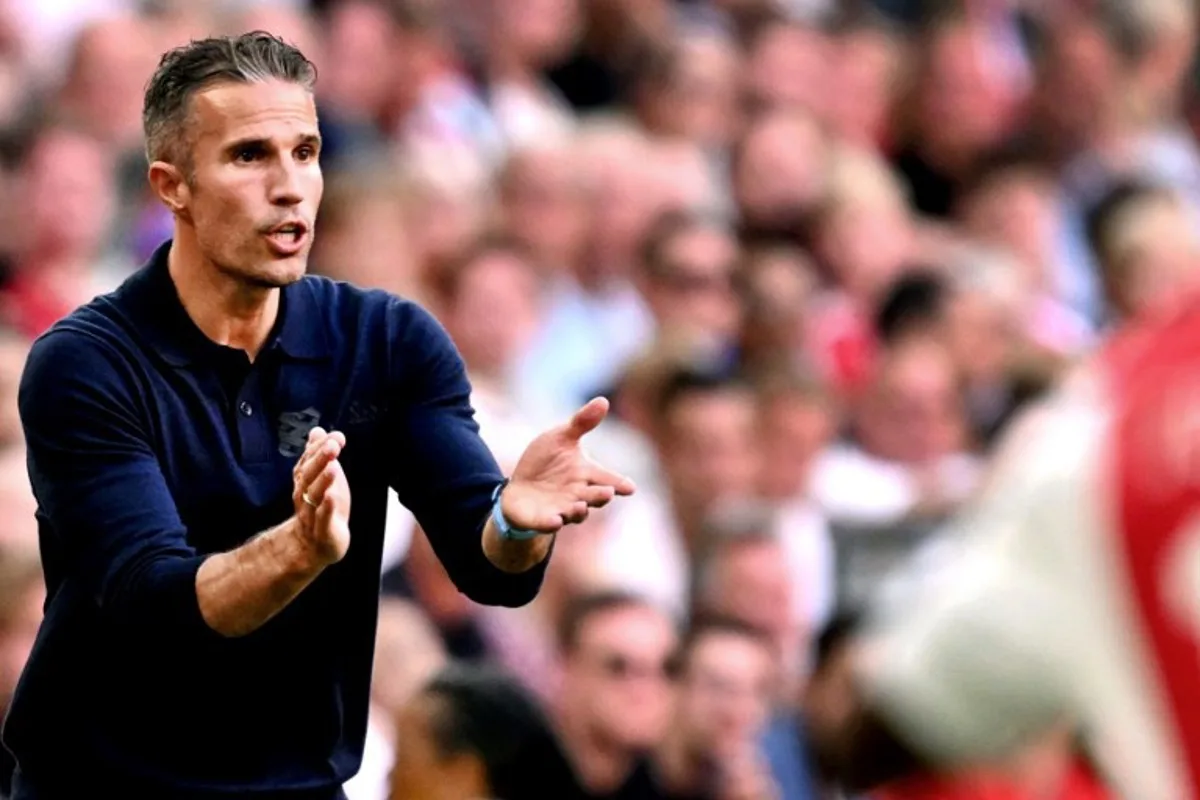 Heerenveen's Dutch head coach Robin van Persie gestures from the techincal area during the Dutch Eredivisie match between Ajax Amsterdam and SC Heerenveen at the Johan Cruyff Arena in Amsterdam on August 11, 2024.  Olaf Kraak / ANP / AFP