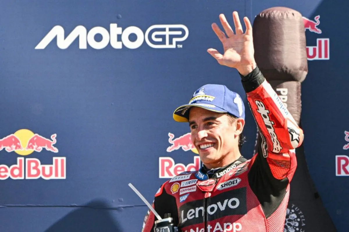 Ducati Lenovo Team's Spanish rider Marc Marquez celebrates his victory at the end of the San Marino Moto GP Grand Prix at the Misano World Circuit Marco Simoncelli, in Misano Adriatico, northern Italy on September 13, 2026.  Andreas SOLARO / AFP