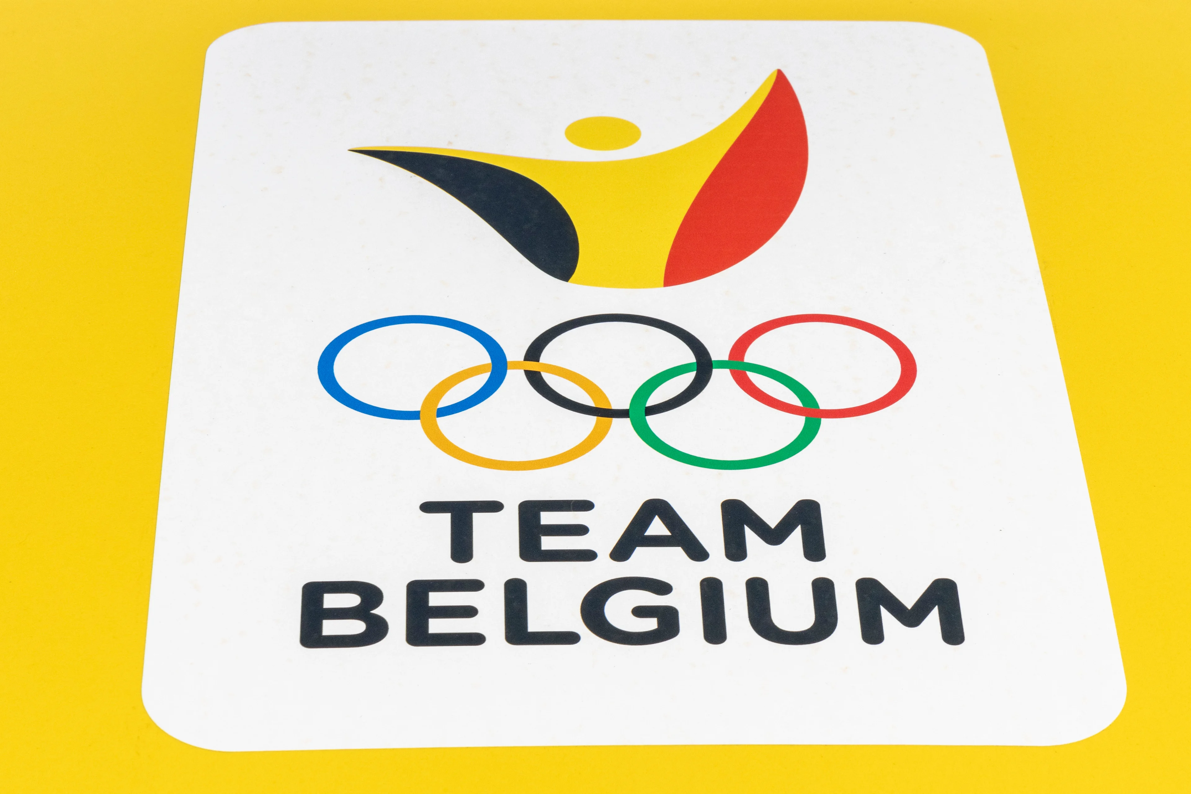 The Team Belgium logo with the Olympic rings is seen at the start of the 'Ride to Paris' event from the BOIC/COIB, in Tubize, Wednesday 24 July 2024. A peloton of 26 participants, made up of cycling enthusiasts, will take part in this ride towards Paris. BELGA PHOTO NICOLAS MAETERLINCK