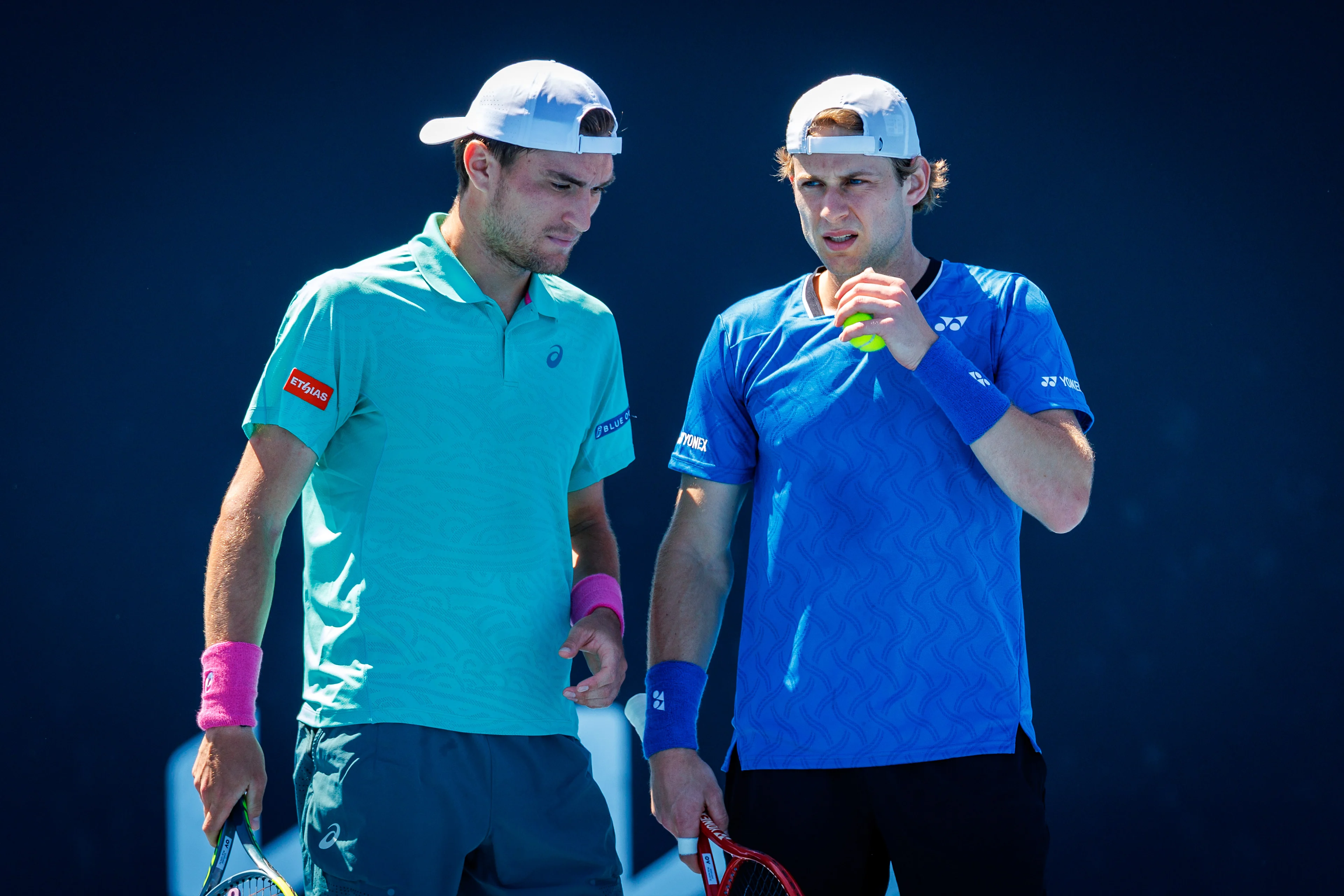 Belgian Raphael Collignon, Belgian Zizou Bergs and pictured during a first round match of Belgium's Bergs/Collignon against Australia's pair McCabe/Tu in the men doubles at the Australian Open, Melbourne Park, Melbourne on Wednesday 21 January 2026. McCabe/Tu won the game. BELGA PHOTO PATRICK HAMILTON  --- BENELUX ONLY   ---