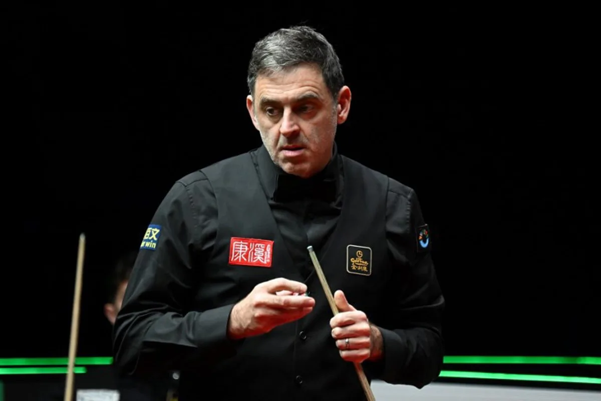 Britain's Ronnie O'Sullivan prepares to play a shot against compatriot Joe O'Connor in round 1 of the Snooker World Grand Prix 2026 in Hong Kong on February 4, 2026.  Peter PARKS / AFP
