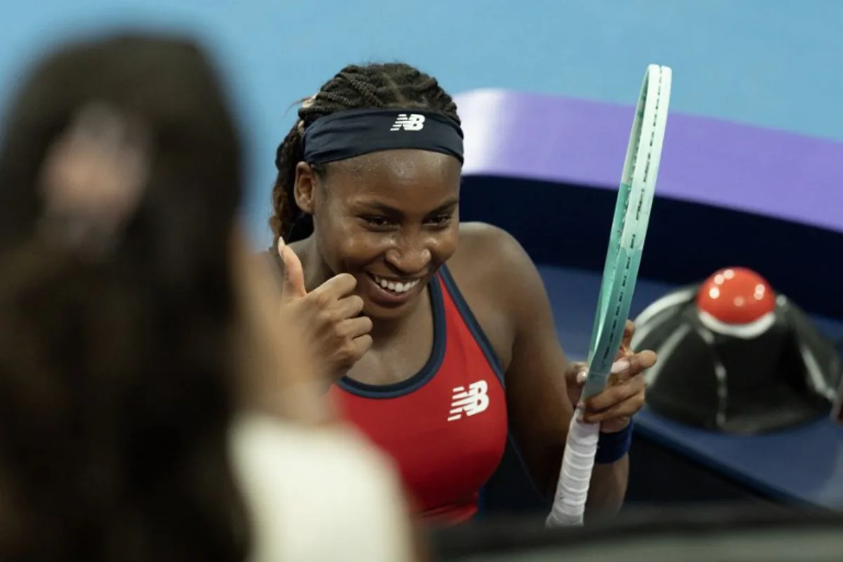 USA's Coco Gauff celebrates defeating Czech Republic's Karolina Muchova in their women's singles semi-final match at the United Cup tennis tournament on Ken Rosewall Arena in Sydney on January 4, 2025.   Steve CHRISTO / AFP