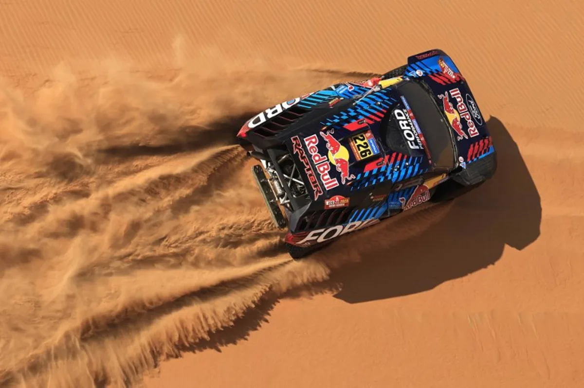 Swedish driver Mattias Ekstrom and Swedish co-driver Emil Bergkvist compete in Stage 10 of the Dakar Rally 2025, between Haradh and Shubaytah, Saudi Arabia, on January 15, 2025.  Valery HACHE / AFP