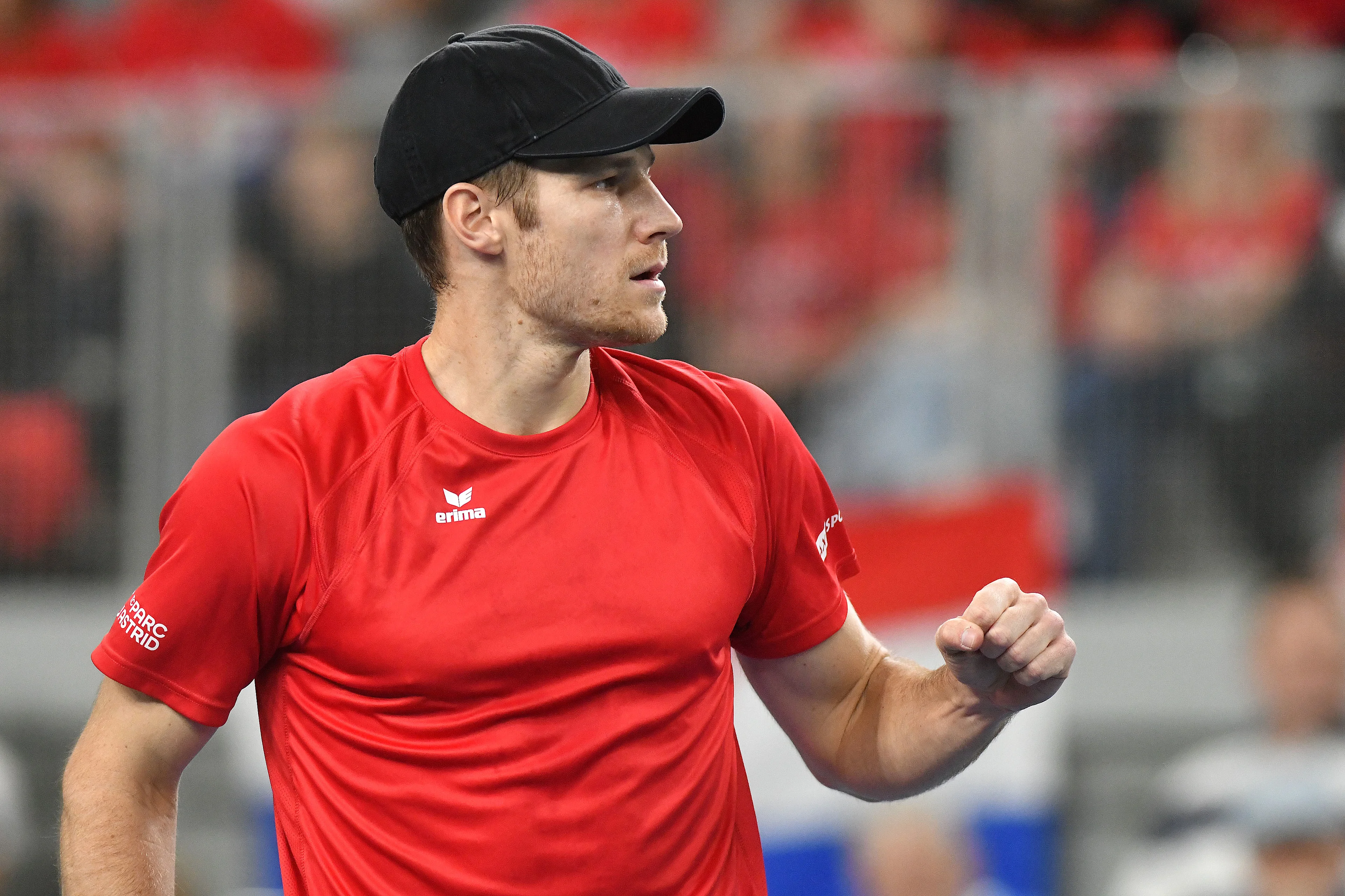 Belgian Joris De Loore pumps his fist during a tennis match between Belgian De Loore and and Croatian Ajdukovic, the 2nd rubber of the Davis Cup Qualifiers meeting between Croatia and Belgium, Saturday 03 February 2024 in Varazdin, Croatia. BELGA PHOTO VJERAN ZGANEX ROGULJA  ***BELGIUM ONLY***