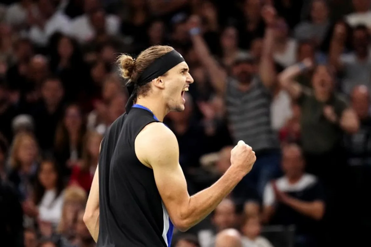 Germany's Alexander Zverev reacts after a point as he plays against Denmark's Holger Rune during their men's singles semi final match on day six of the Paris ATP Masters 1000 tennis tournament at the Accor Arena - Palais Omnisports de Paris-Bercy - in Paris on November 2, 2024.  Dimitar DILKOFF / AFP