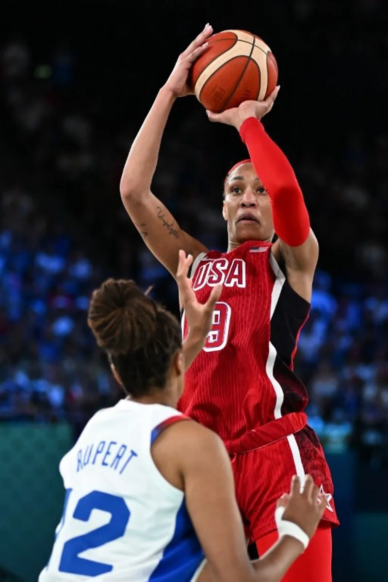 USA's #09 A'ja Wilson takes a shot in the women's Gold Medal basketball match between France and the USA during the Paris 2024 Olympic Games at the Bercy  Arena in Paris on August 11, 2024.  Aris MESSINIS / AFP
