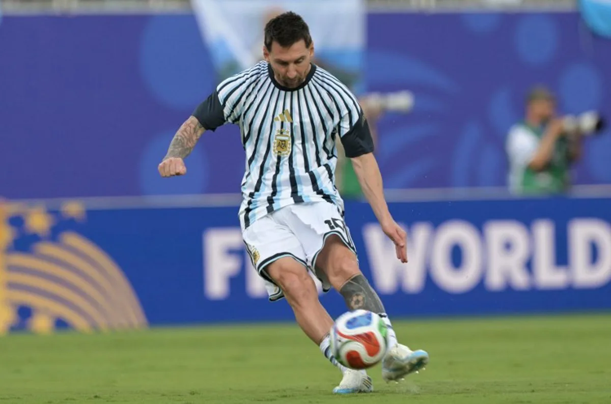 Argentina's forward #10 Lionel Messi kicks the ball during the warm-up ahead of the 2026 World Cup Group J football match between Argentina and Algeria at the Kansas City Stadium in Kansas City on June 16, 2026. JUAN MABROMATA / AFP