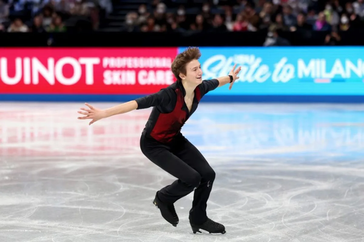 Belgium's Denis Krouglov competes in the Junior Men Short Program at the ISU Grand Prix of Figure Skating Final in Nagoya on December 4, 2025.  PAUL MILLER / AFP