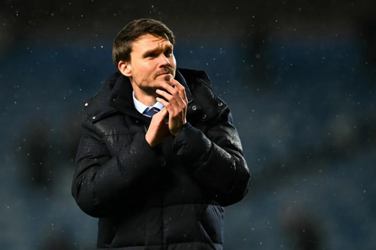 Rangers' German head coach Danny Rohl applauds the fans following the UEFA Europa League, league-stage football match between Rangers and Ludogorets Razgrad at the Ibrox Stadium in Glasgow on January 22, 2026.  ANDY BUCHANAN / AFP