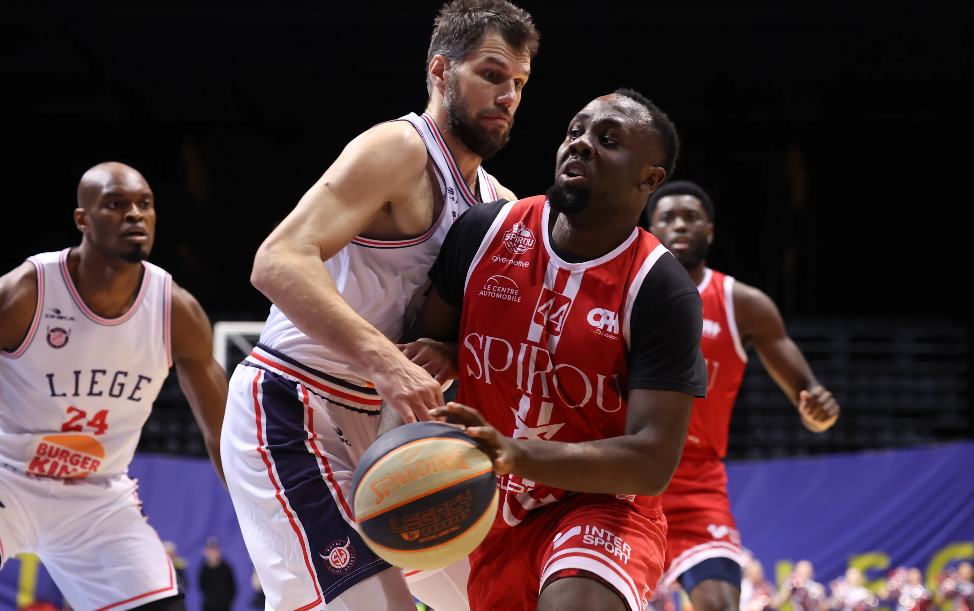 Liege's Milos Bojovic and Spirou's Marlon Makwa fight for the ball during a basketball match between RSW Liege Basket and Spirou Charleroi, Friday 10 May 2024 in Liege, game 2 (best of 3) in the Belgian Play-offs quarter-finals phase of the 'BNXT League' Belgian and Netherlands first division basket championship. BELGA PHOTO VIRGINIE LEFOUR