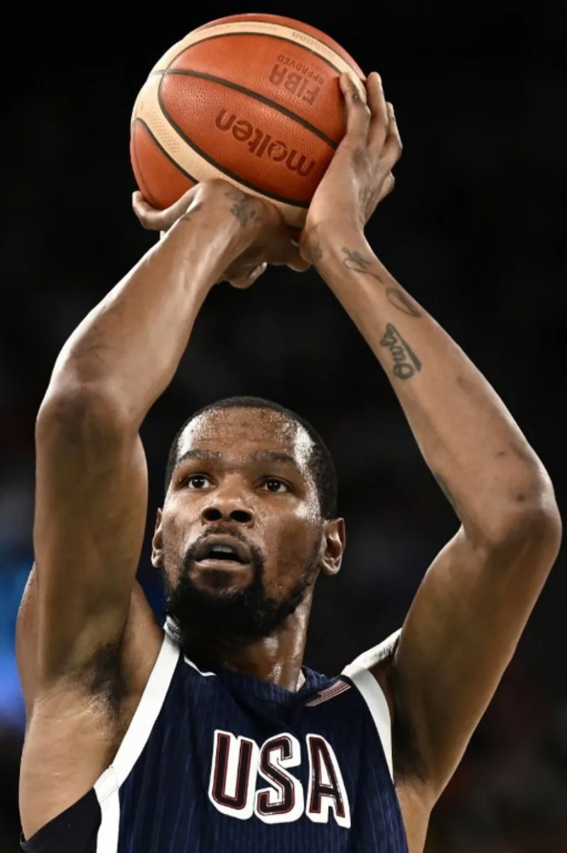 USA's #07 Kevin Durant takes a free throw in the men's quarterfinal basketball match between Brazil and the USA during the Paris 2024 Olympic Games at the Bercy Arena in Paris on August 6, 2024. Aris MESSINIS / AFP
