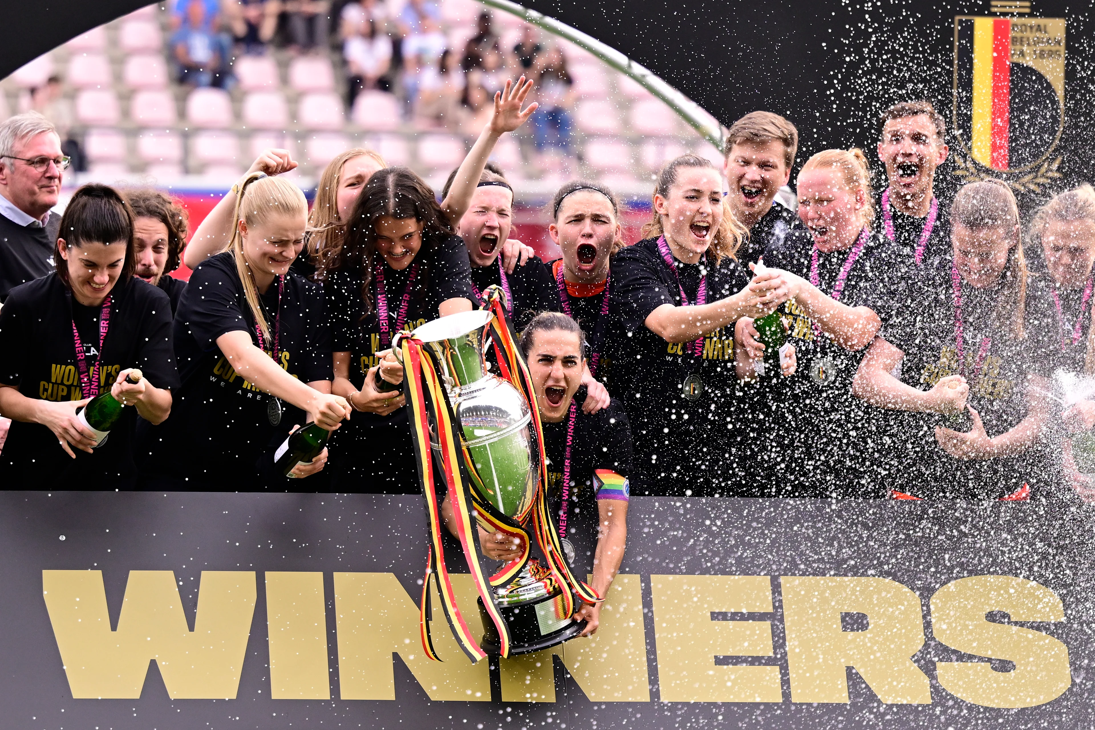 YLA's players celebrate on the podium after winning the match between Club YLA and OHL women, the final of the Belgian Cup, in Heverlee, Wednesday 01 May 2024. BELGA PHOTO LAURIE DIEFFEMBACQ