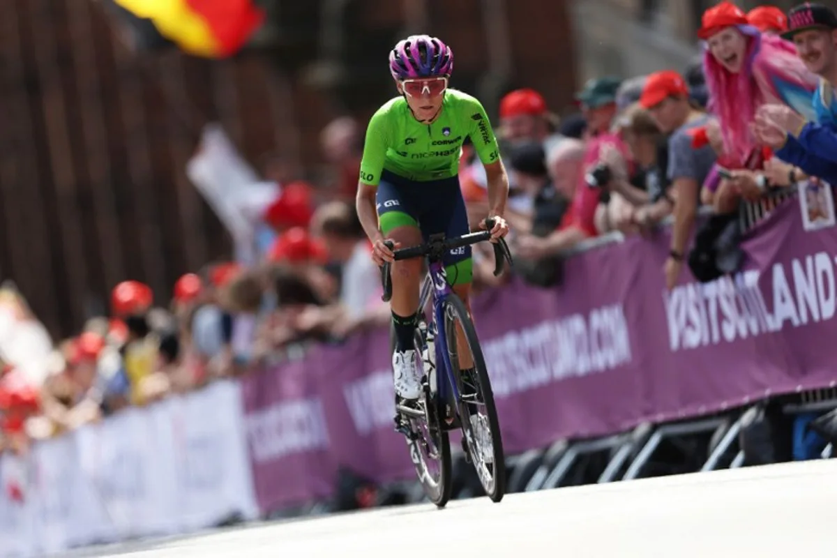 Slovenia's Urska Zigart takes part in the women's Elite Road Race during the UCI Cycling World Championships in Glasgow, Scotland on August 13, 2023.  Adrian DENNIS / AFP