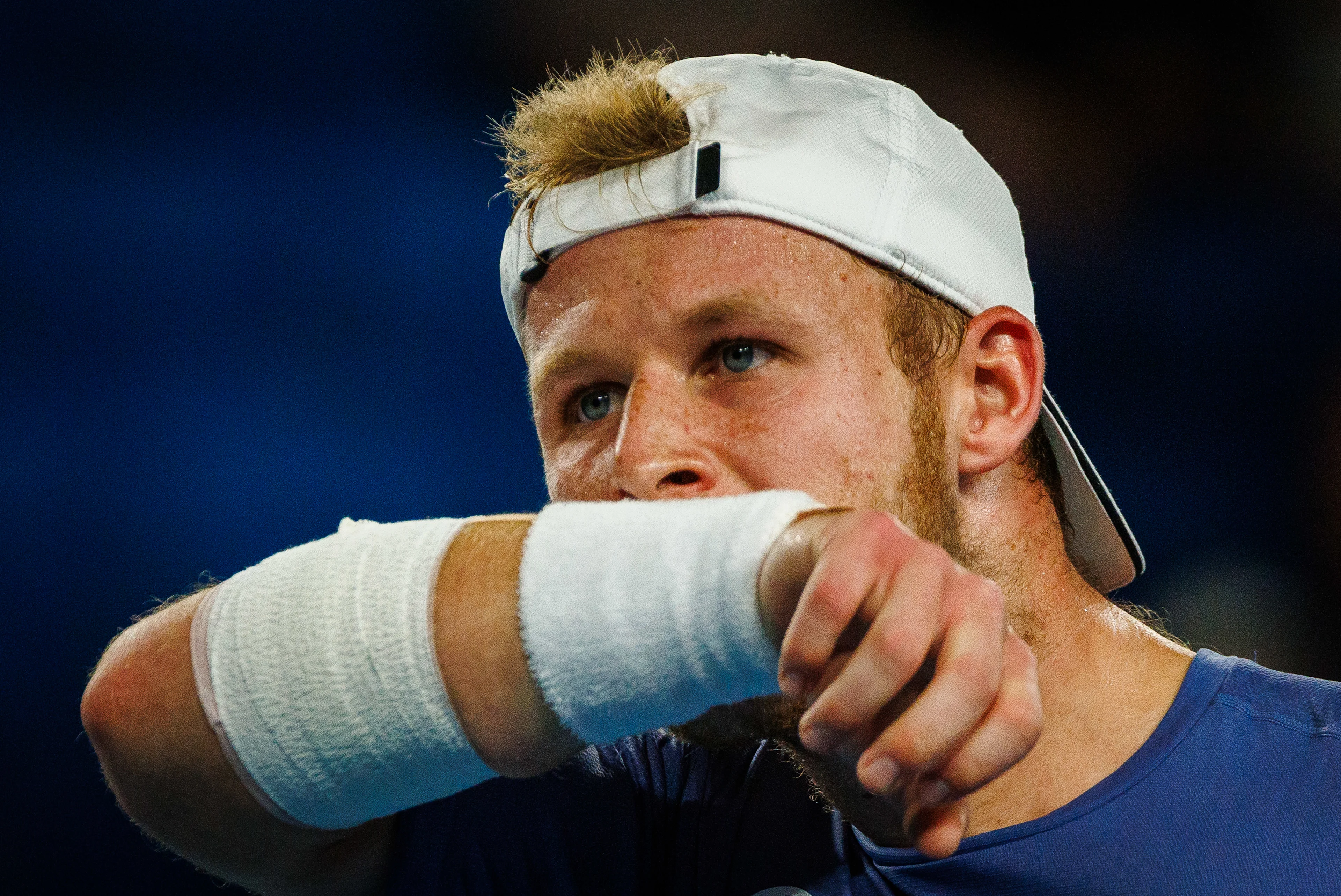 Belgian Gauthier Onclin pictured in action during a men's singles first round game between Belgian Onclin and American Opelka, at the 'Australian Open' Grand Slam tennis tournament, Sunday 12 January 2025 in Melbourne Park, Melbourne, Australia. The 2025 edition of the Australian Grand Slam takes place from January 12th to January 26th. BELGA PHOTO PATRICK HAMILTON