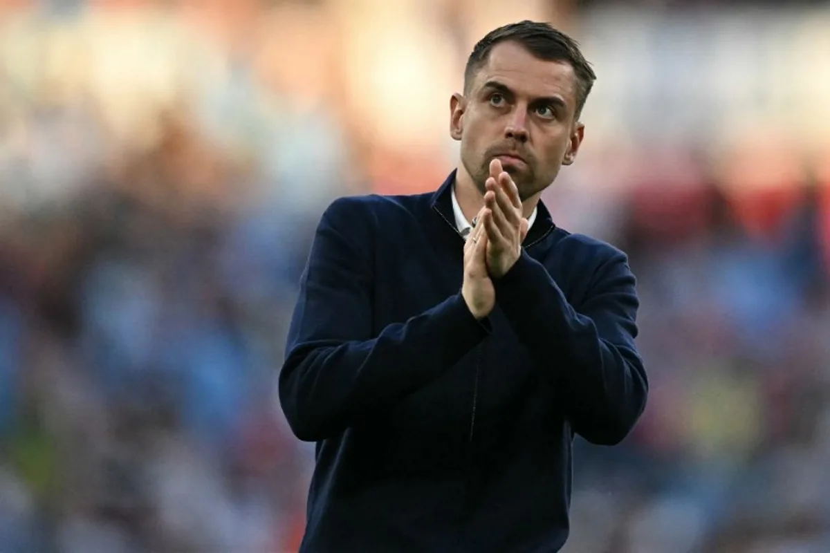 Southampton's German head coach Tonda Eckert applauds fans on the pitch after the English FA Cup semi final football match between Manchester City and Southampton at Wembley stadium in London, on April 25, 2026. City won the game 2-1 Ben STANSALL / AFP