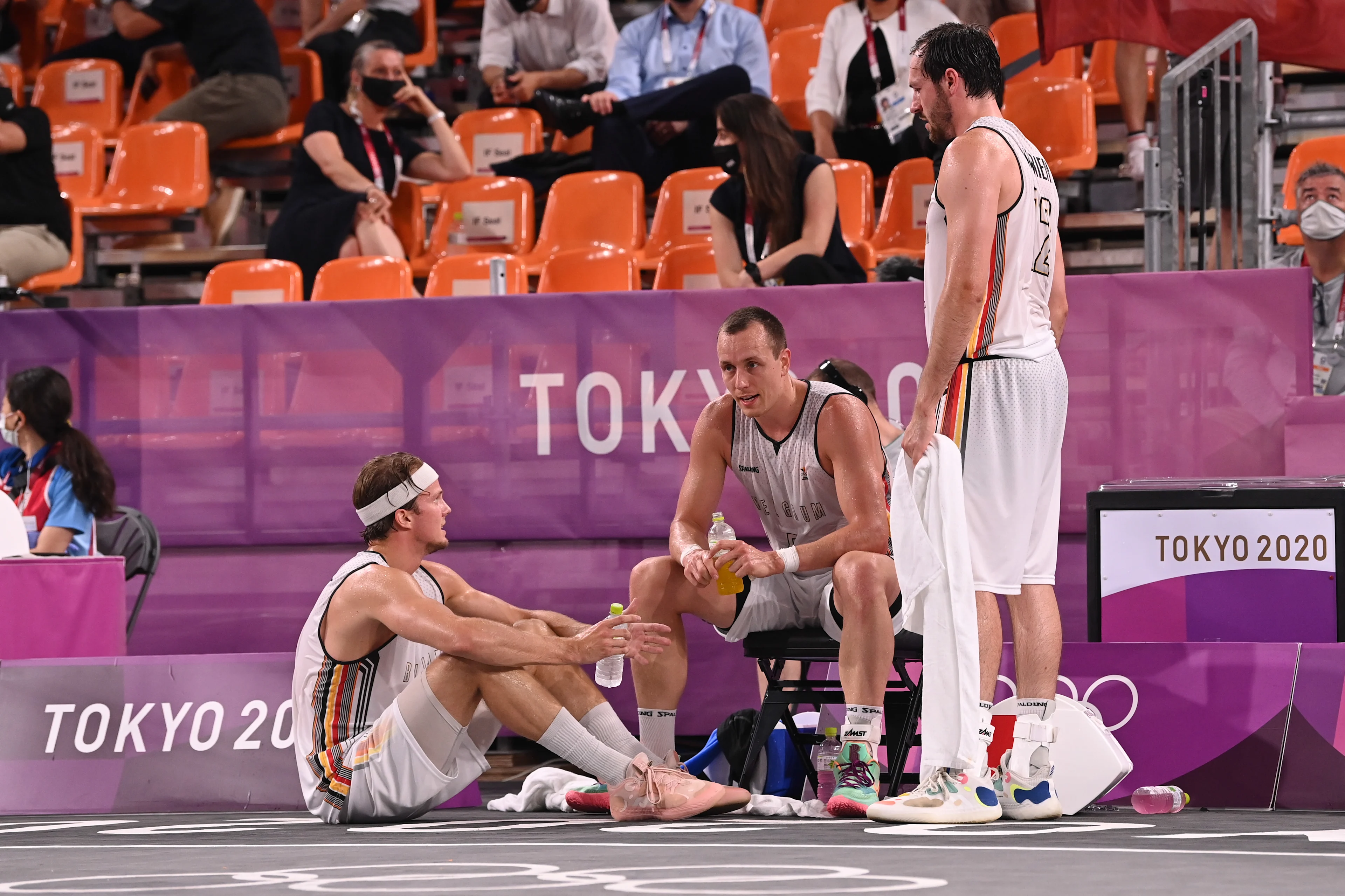 Belgian Thibaut Vervoort, Belgian Nick Celis and Belgian Thierry Marien look dejected after losing the semifinal game of Basket 3x3 between Belgium and Latvia on the sixth day of the 'Tokyo 2020 Olympic Games' in Tokyo, Japan on Wednesday 28 July 2021. The postponed 2020 Summer Olympics are taking place from 23 July to 8 August 2021. BELGA PHOTO DIRK WAEM