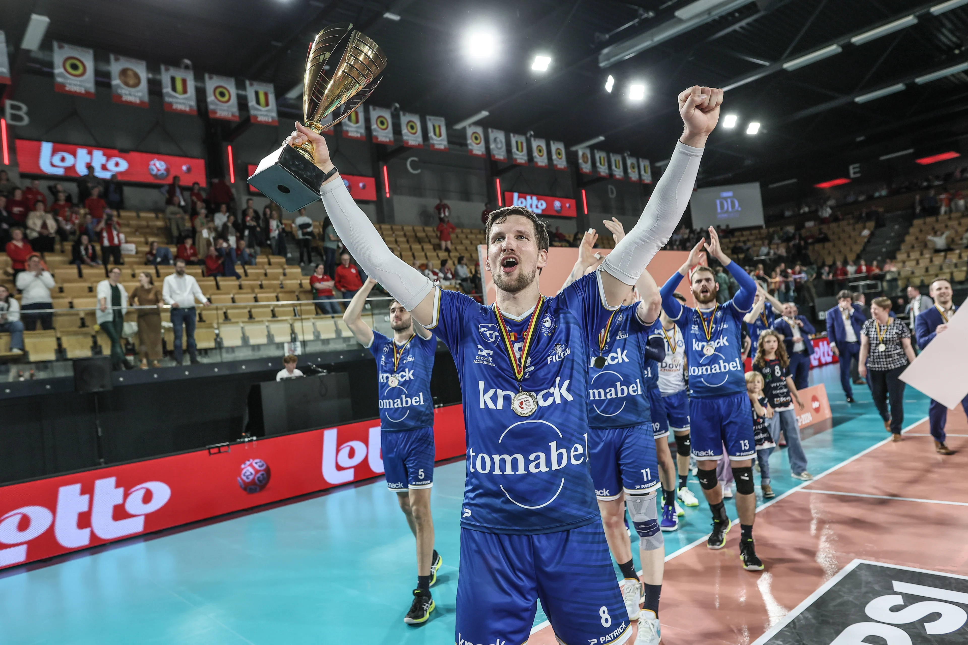 Roeselare's players celebrate after winning a volleyball match between Greenyard Maaseik and Knack Roeselare, Sunday 28 April 2024 in Maaseik, the last match of the best-of-five finals in the Play Offs of the Belgian volleyball competition. BELGA PHOTO BRUNO FAHY