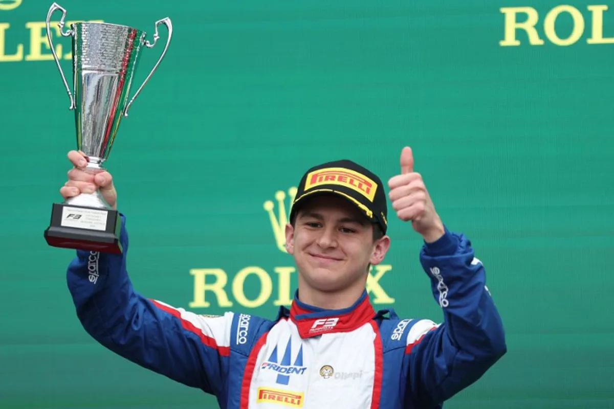 Second-placed Trident's Italian driver Leonardo Fornaroli celebrates on the podium after the Australia Formula 3 Grand Prix at the Albert Park Circuit in Melbourne on March 24, 2024. Martin KEEP / AFP