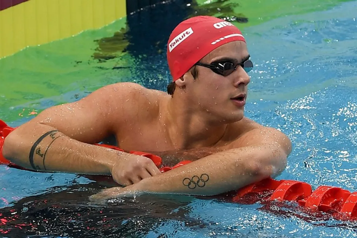 Switzerland's Noe Ponti looks on after a heat of the men's 100m medley event during the World Aquatics Swimming World Cup 2024 - Stop 3 in Singapore on October 31, 2024.  Roslan RAHMAN / AFP