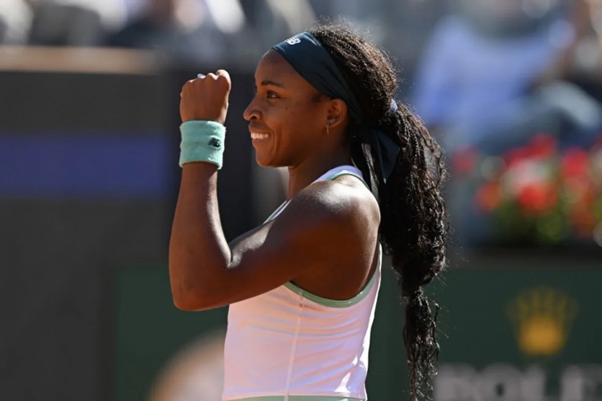 USA's Coco Gauff celebrates after winning against Romania's Sorana Cirstea during the ATP Rome Open tennis tournament at Foro Italico in Rome on May 14, 2026. Tiziana FABI / AFP