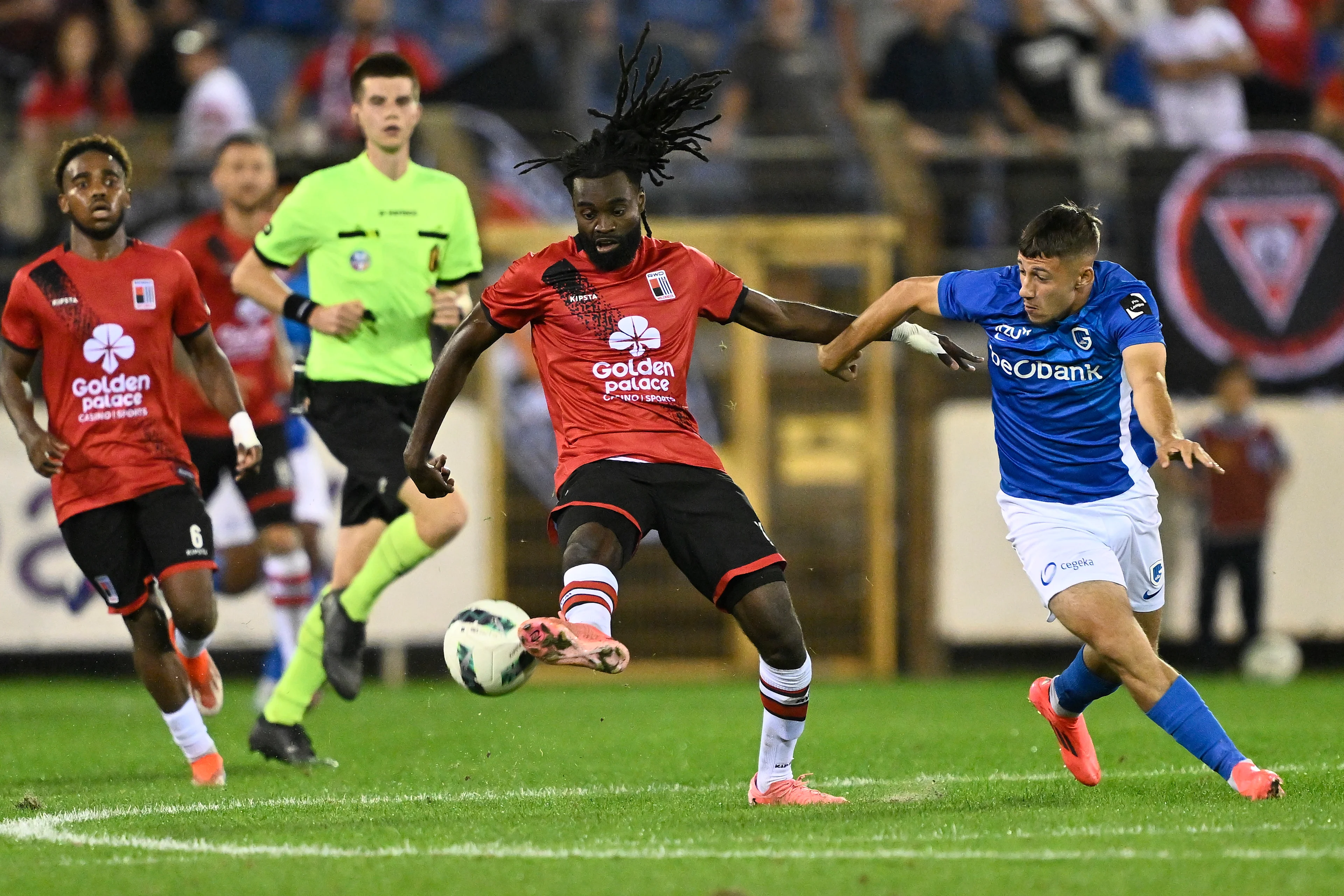 Rwdm's Marsoni Sambu and Genk's Cedric Nuozzi fight for the ball during a soccer match between Jong Genk and RWD Molenbeek, Saturday 21 September 2024 in Brussels, on day 5 of the 2024-2025 'Challenger Pro League' 1B second division of the Belgian championship. BELGA PHOTO JOHAN EYCKENS