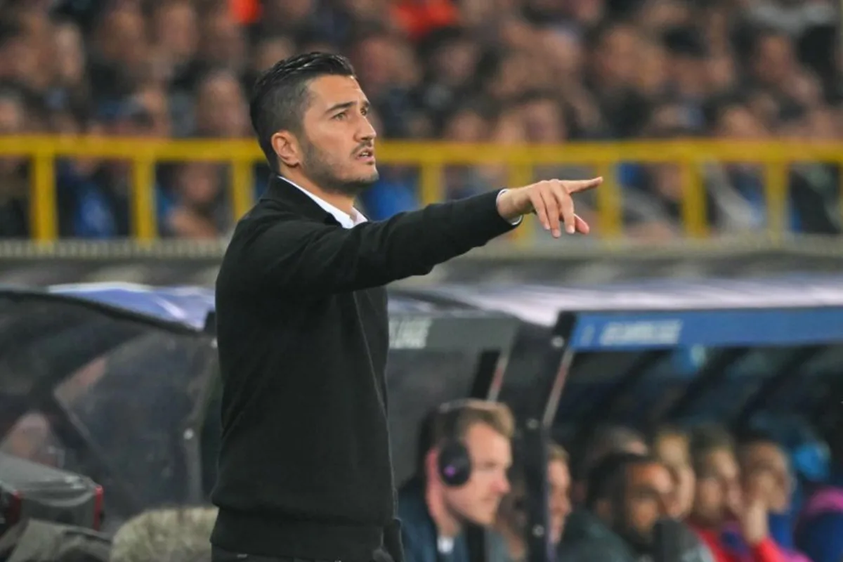 Borussia Dortmund's Turkish coach Nuri Sahin shouts instructions to his players from the touchline during the UEFA Champions League's 1st round day 1 football match between Club Brugge KV and Borussia Dortmund at the Jan Breydel Stadium in Bruges on September 18, 2024.  NICOLAS TUCAT / AFP