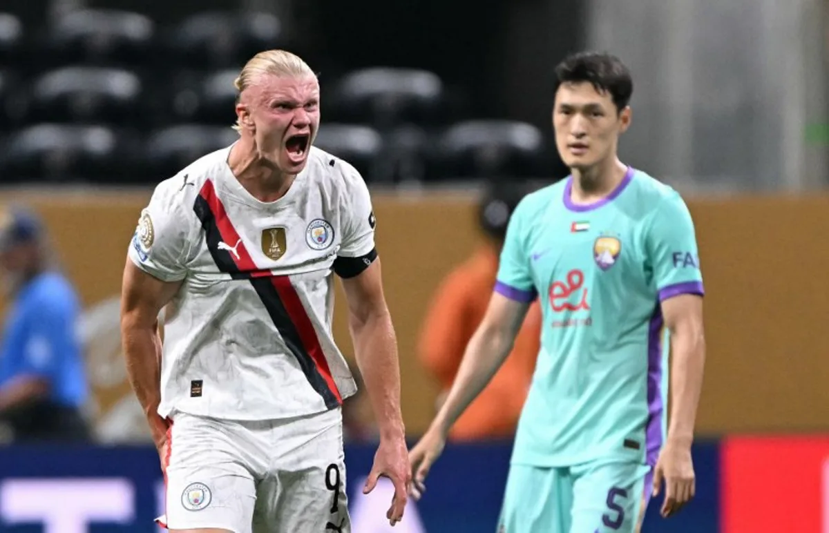 Manchester City's Norwegian striker #09 Erling Haaland reacts next to Al Ain's South Korean defender #05 Park Yongwoo at the end of the FIFA Club World Cup 2025 Group G football match between England's Manchester City and UAE's Al Ain FC at the Mercedes-Benz stadium in Atlanta on June 22, 2025. PATRICIA DE MELO MOREIRA / AFP