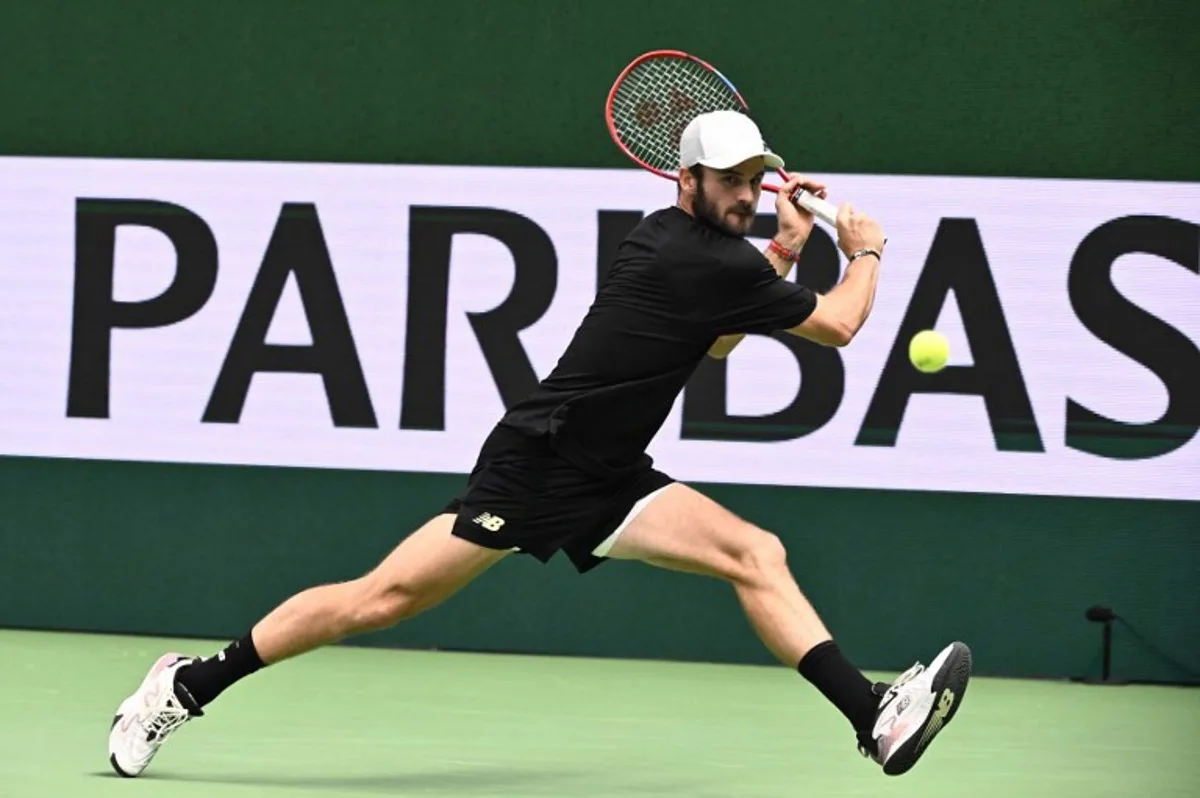 USA's Tommy Paul of USA plays the ball to Switzerland's Stan Wawrinka during the semi final  singles tennis match of the Nordic Open ATP in Stockholm, on October 19, 2024.   Claudio BRESCIANI / TT News Agency / AFP